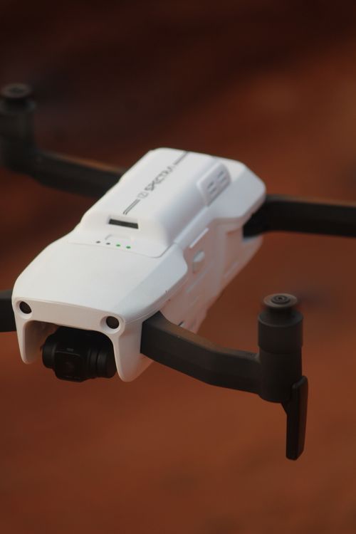 Free Detailed image of a white quadcopter drone showcasing modern design and technology. Stock Photo