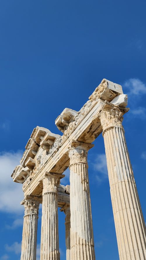 Free Majestic ancient columns of the Temple of Apollo in Side, Turkey against a blue sky. Stock Photo