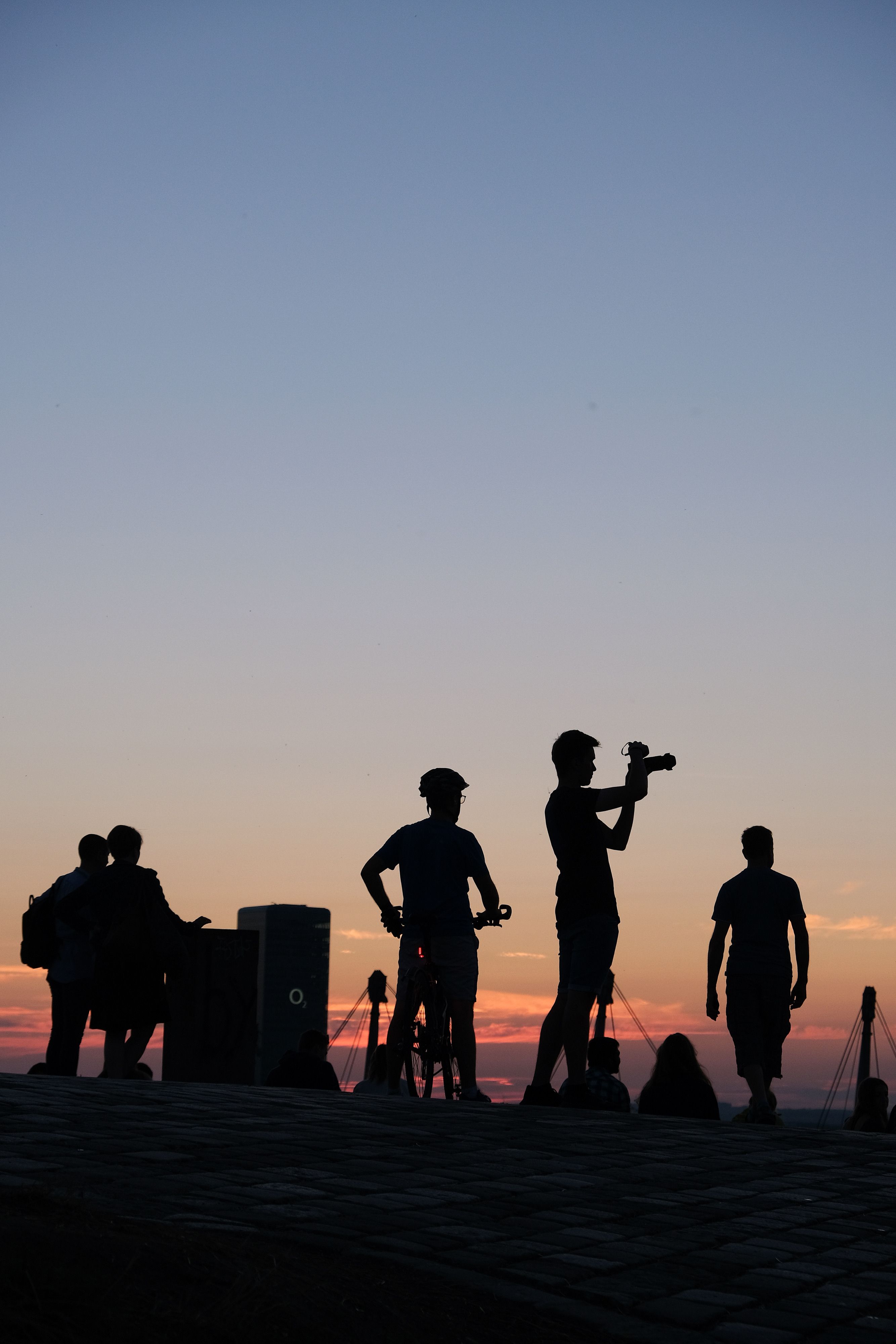 Silhouettes of People at Sunset on a Scenic Hill · Free Stock Photo