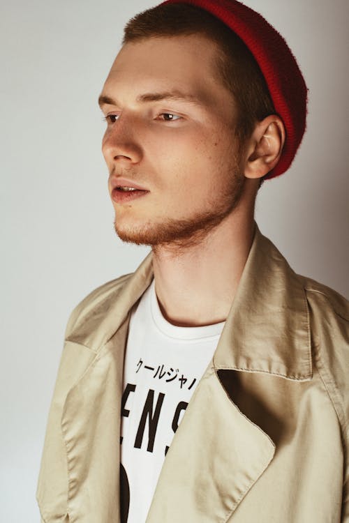 Portrait of a Handsome Man Wearing a Red Beanie