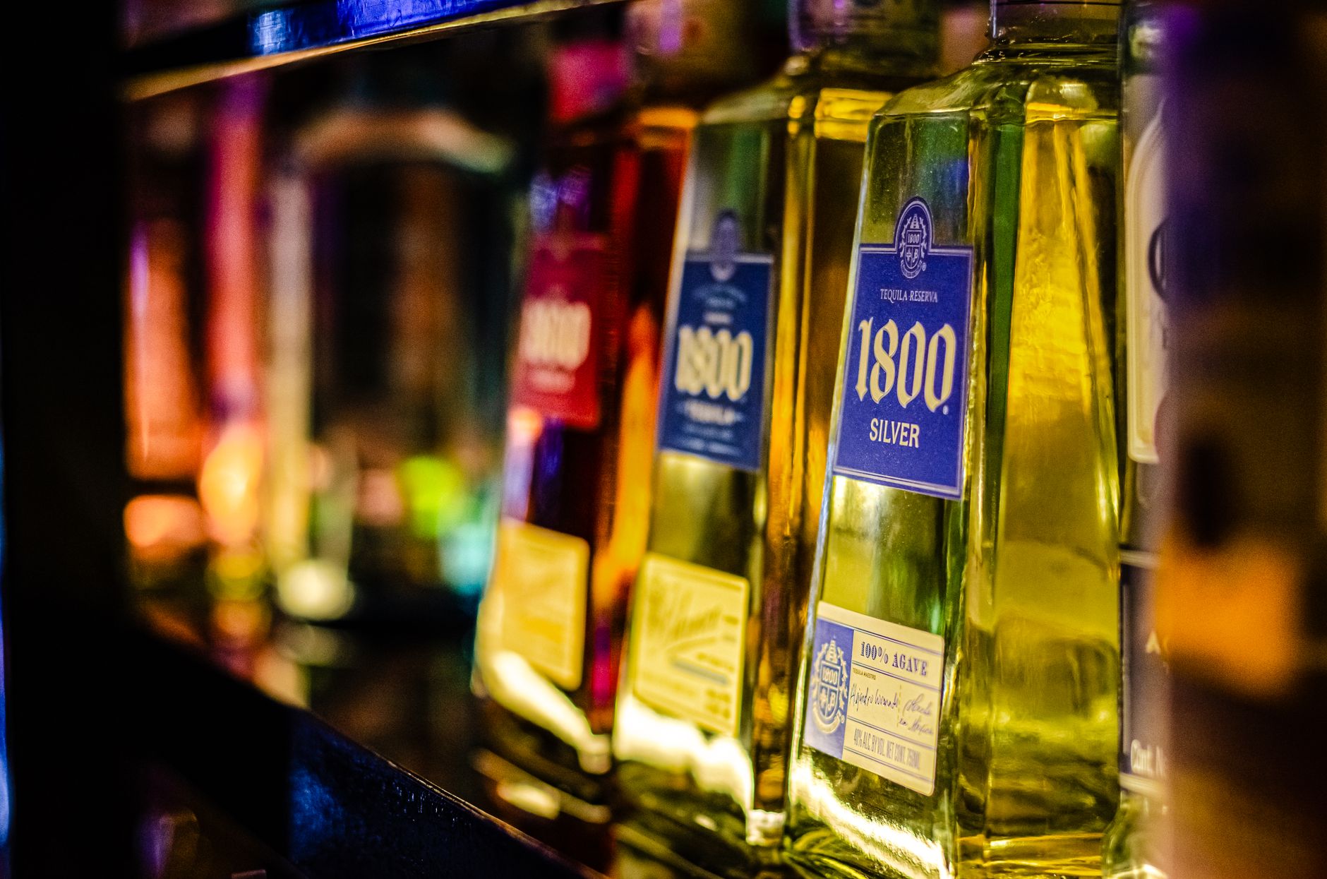 Close-up photo showing NOM number on Kirkland tequila bottle label