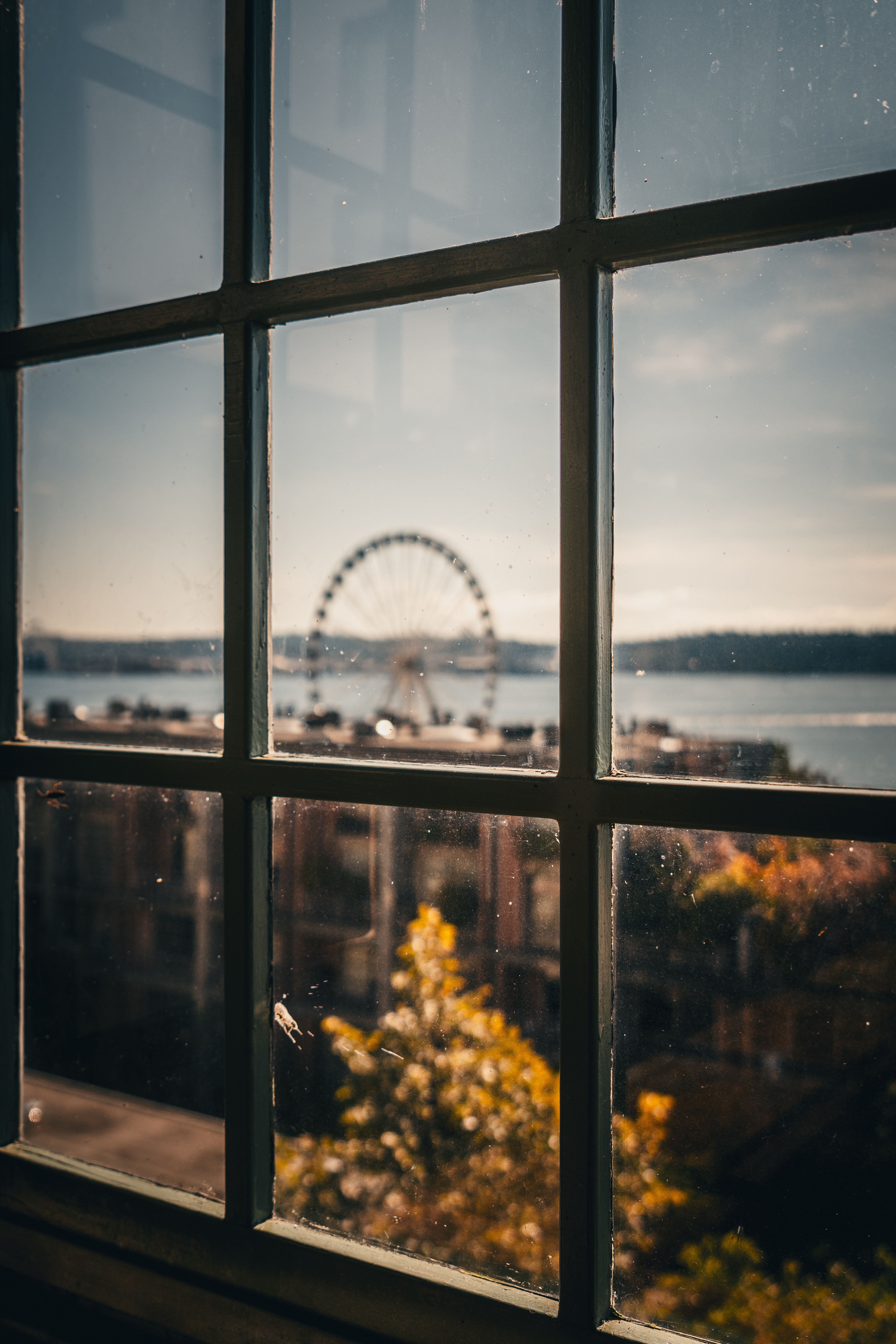 Seattle Great Wheel Seen Through Window Frame · Free Stock Photo
