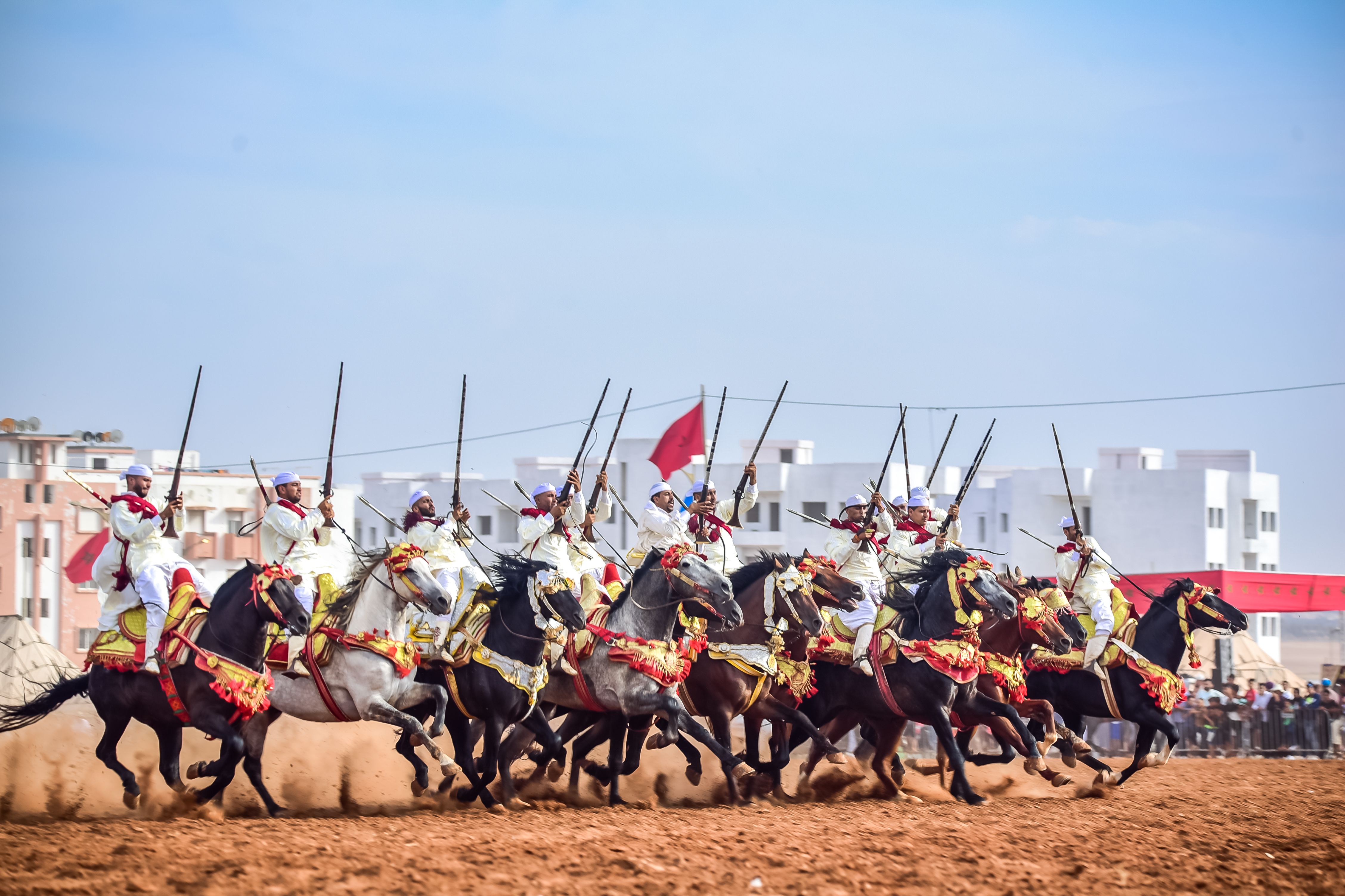 Spectacular display of Moroccan Fantasia with riders and horses in Ain El Aouda.