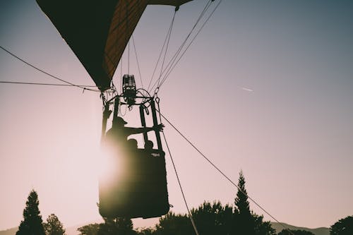 Silhouette of People Riding Hot Air Balloon