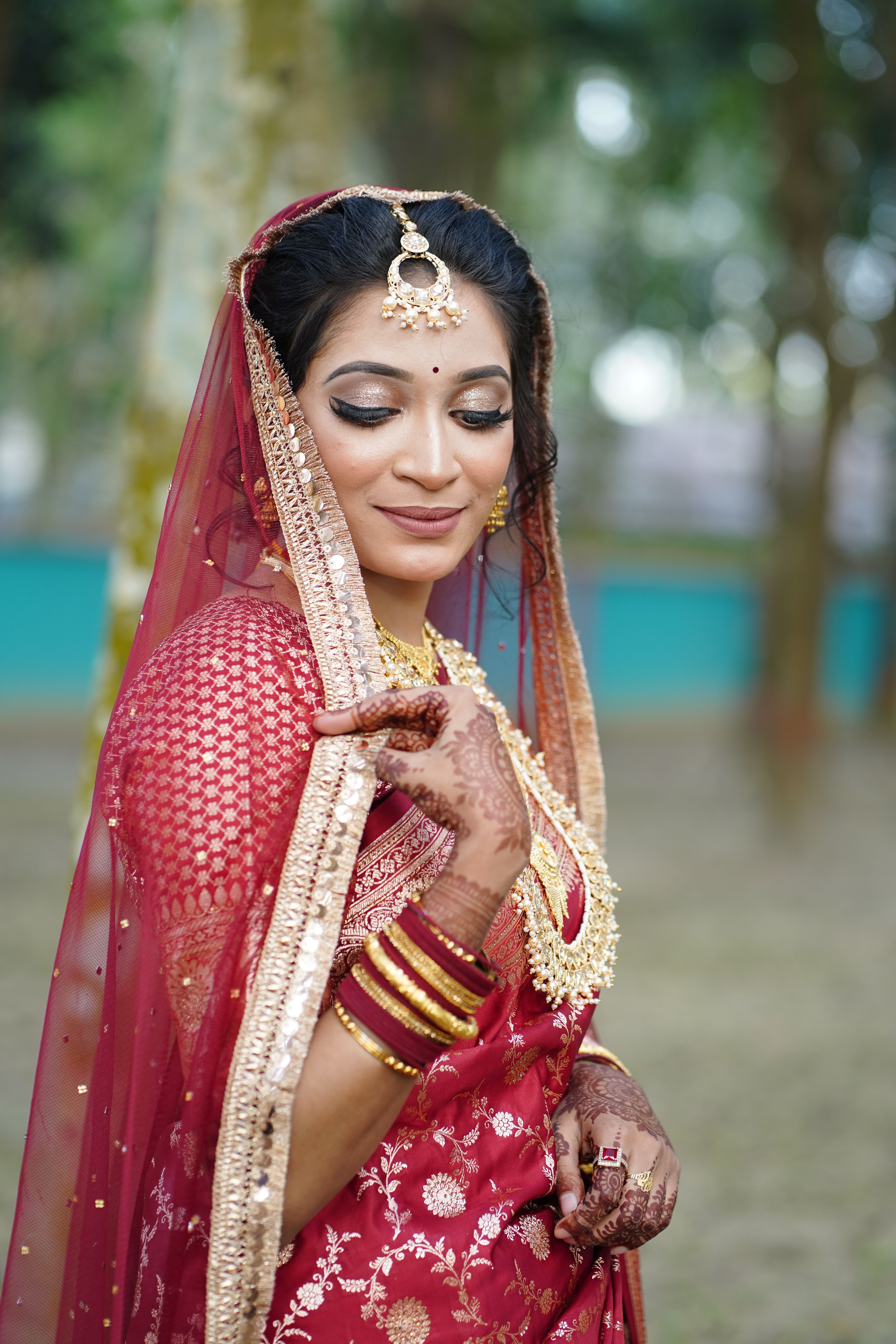 Beautiful Indian Bride in Traditional Attire Outdoors · Free Stock Photo