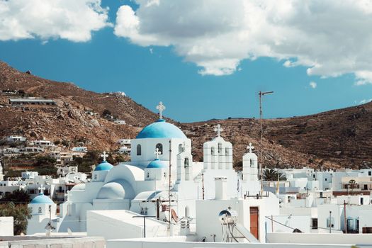 Explore the iconic blue dome churches in Naxos, Greece, showcasing beautiful Aegean architecture.