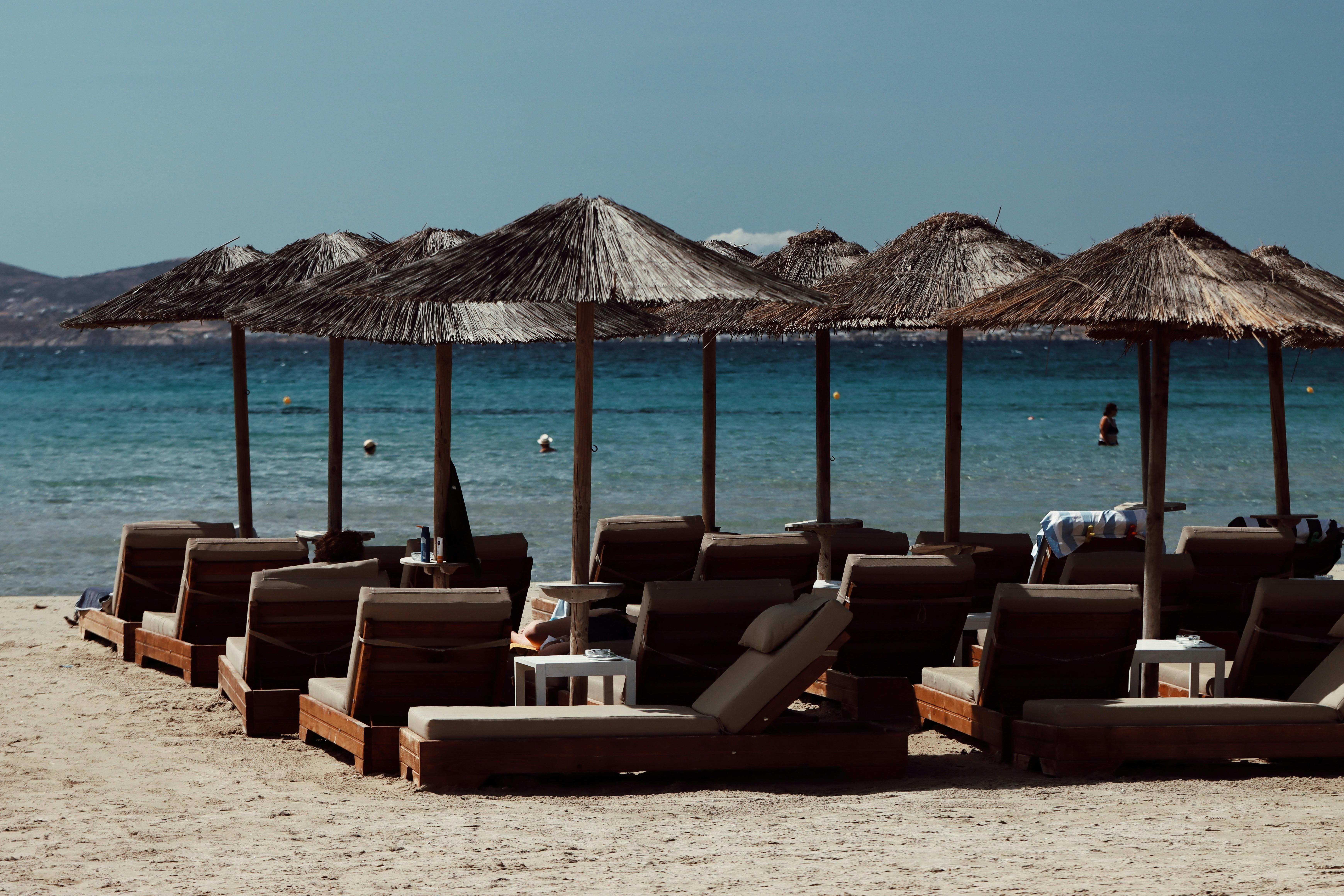 relaxing beach loungers in naxos greece