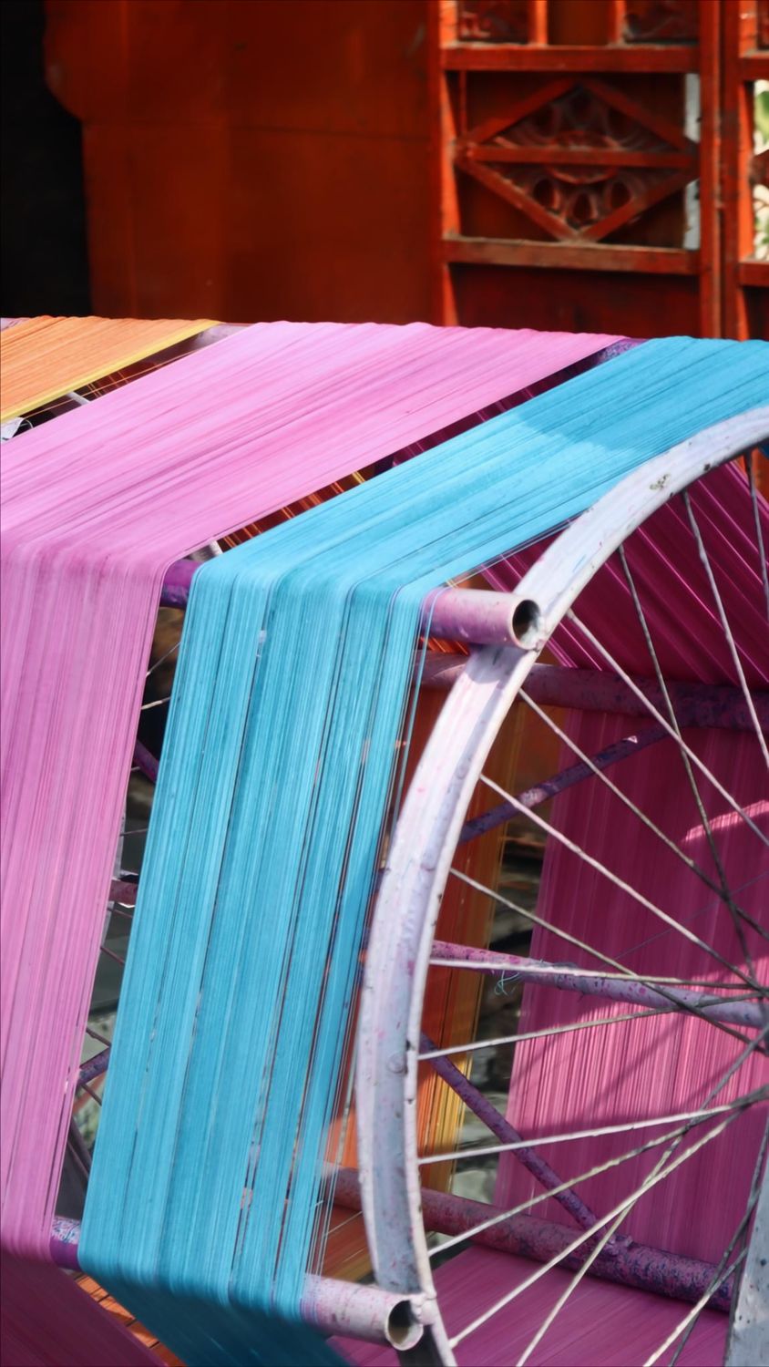 Wheel Thread Cloth Colorful textile threads on weaving wheel · Free Stock Photo
