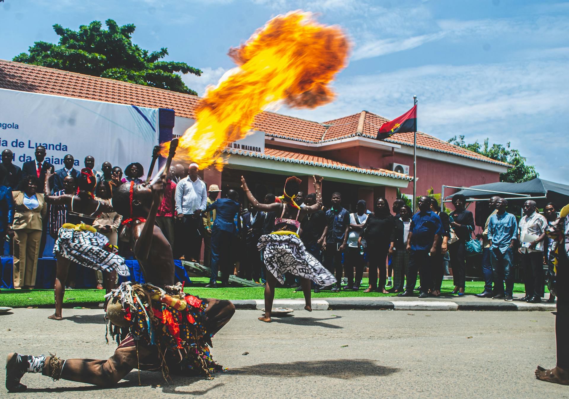 Vibrant fire dance showcasing Angolan culture in Luanda city celebration.