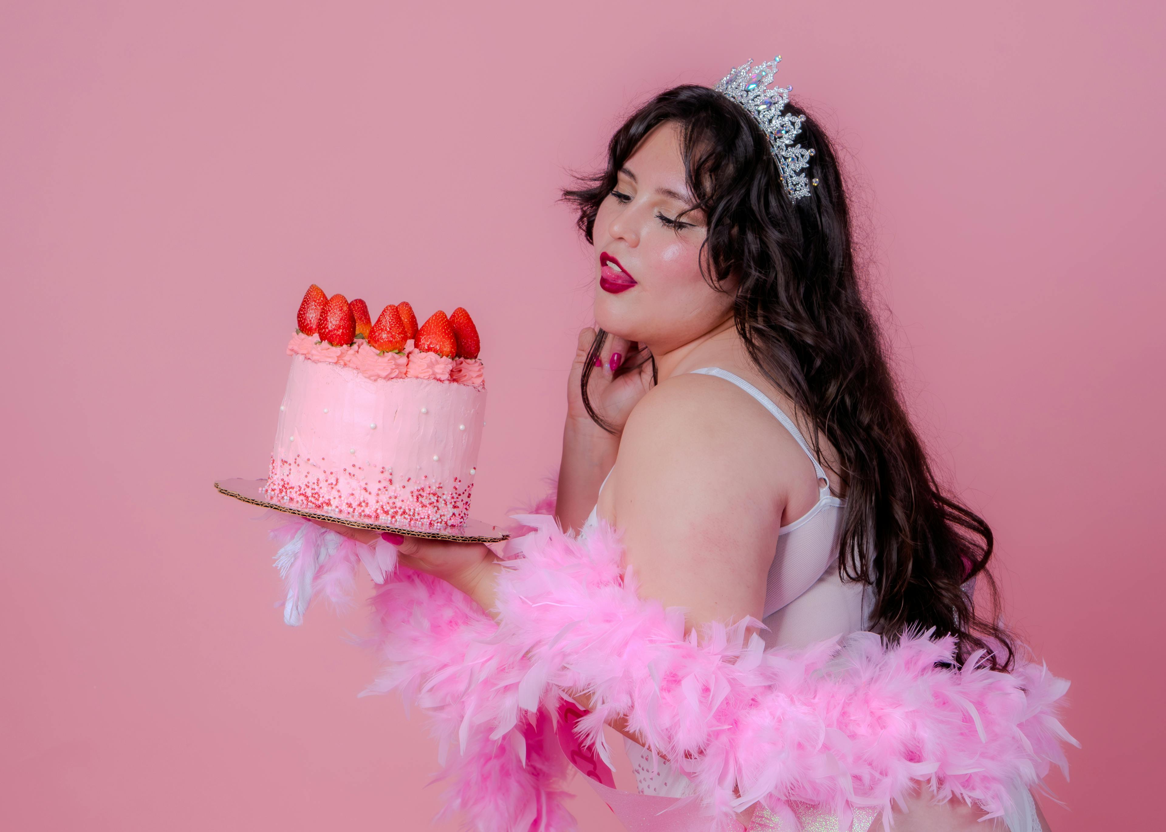 glamorous birthday celebration with pink cake