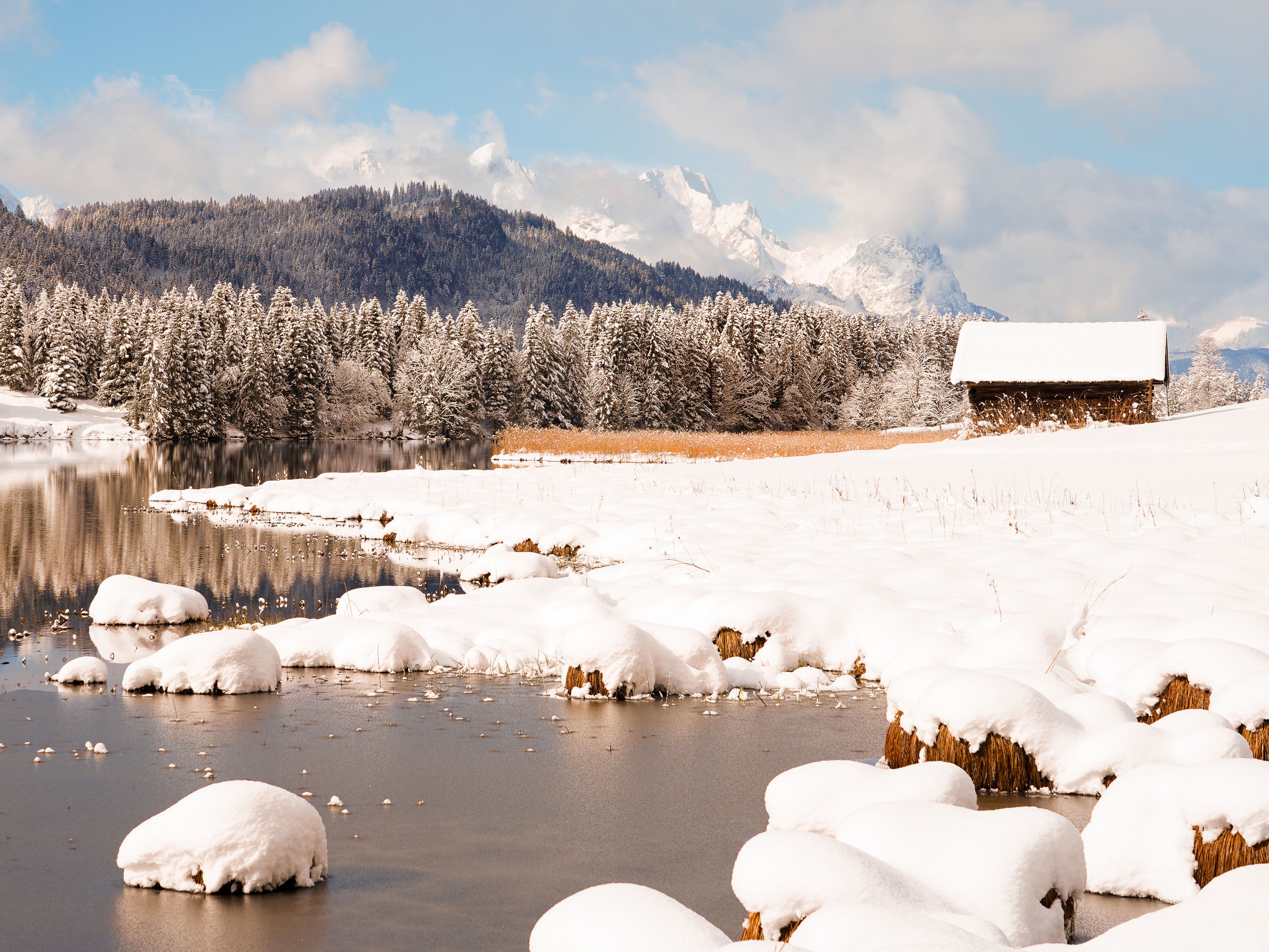 Serene Winter Landscape with Snow-Covered Mountains · Free Stock Photo