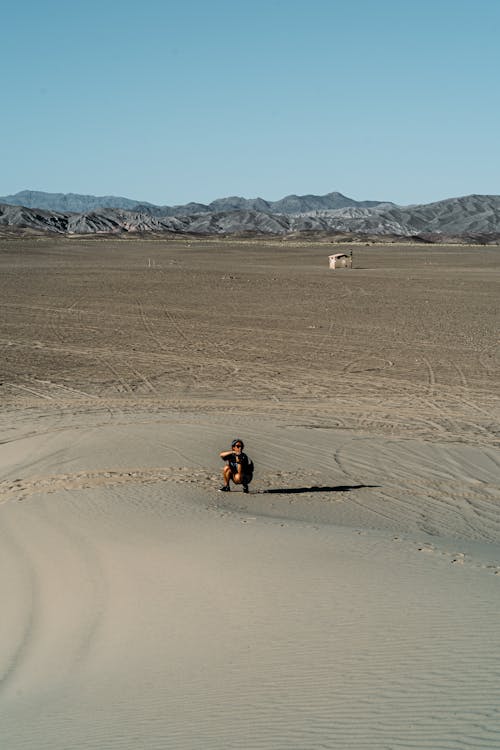 Free Person on Sand Stock Photo