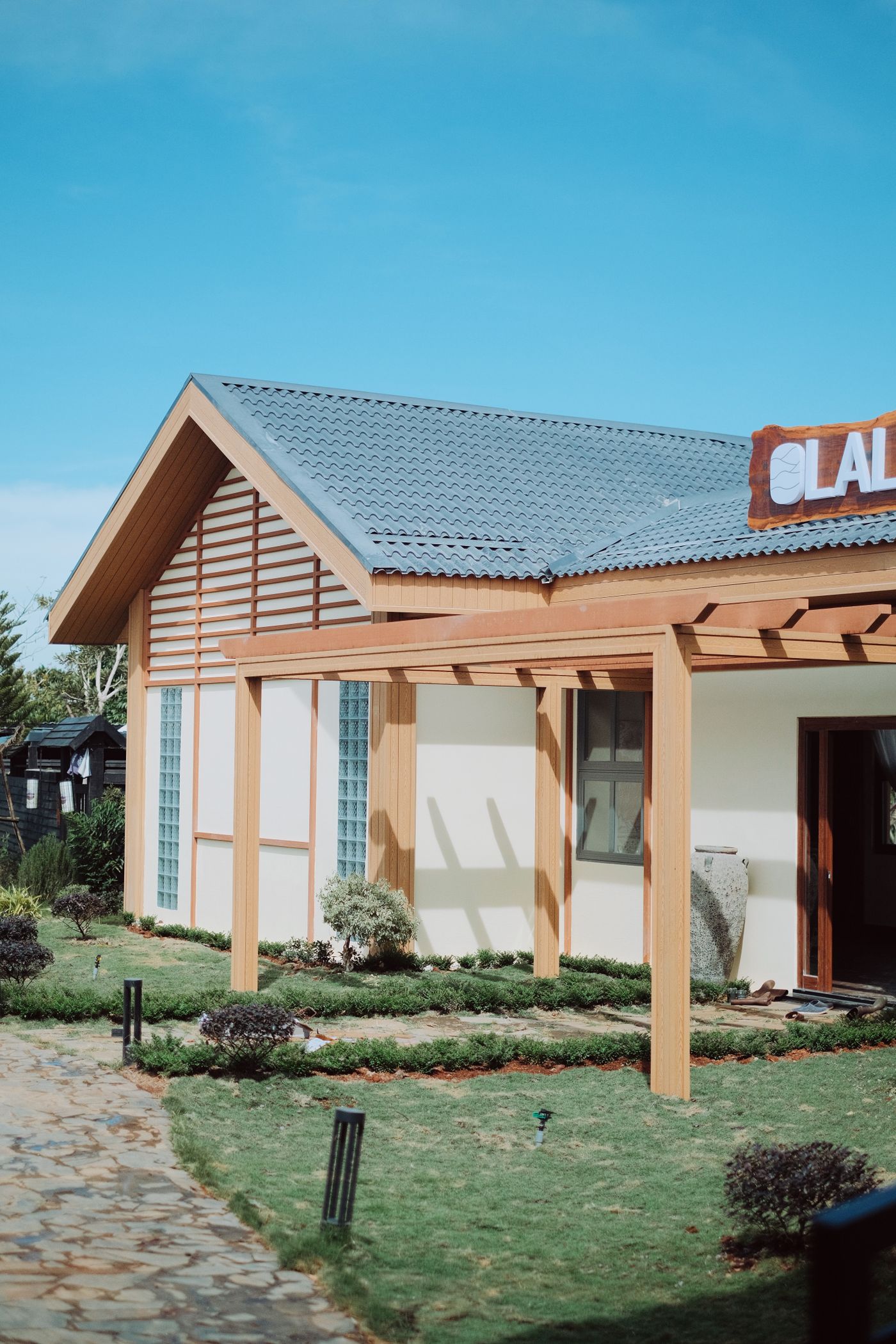 House exterior with garden lighting