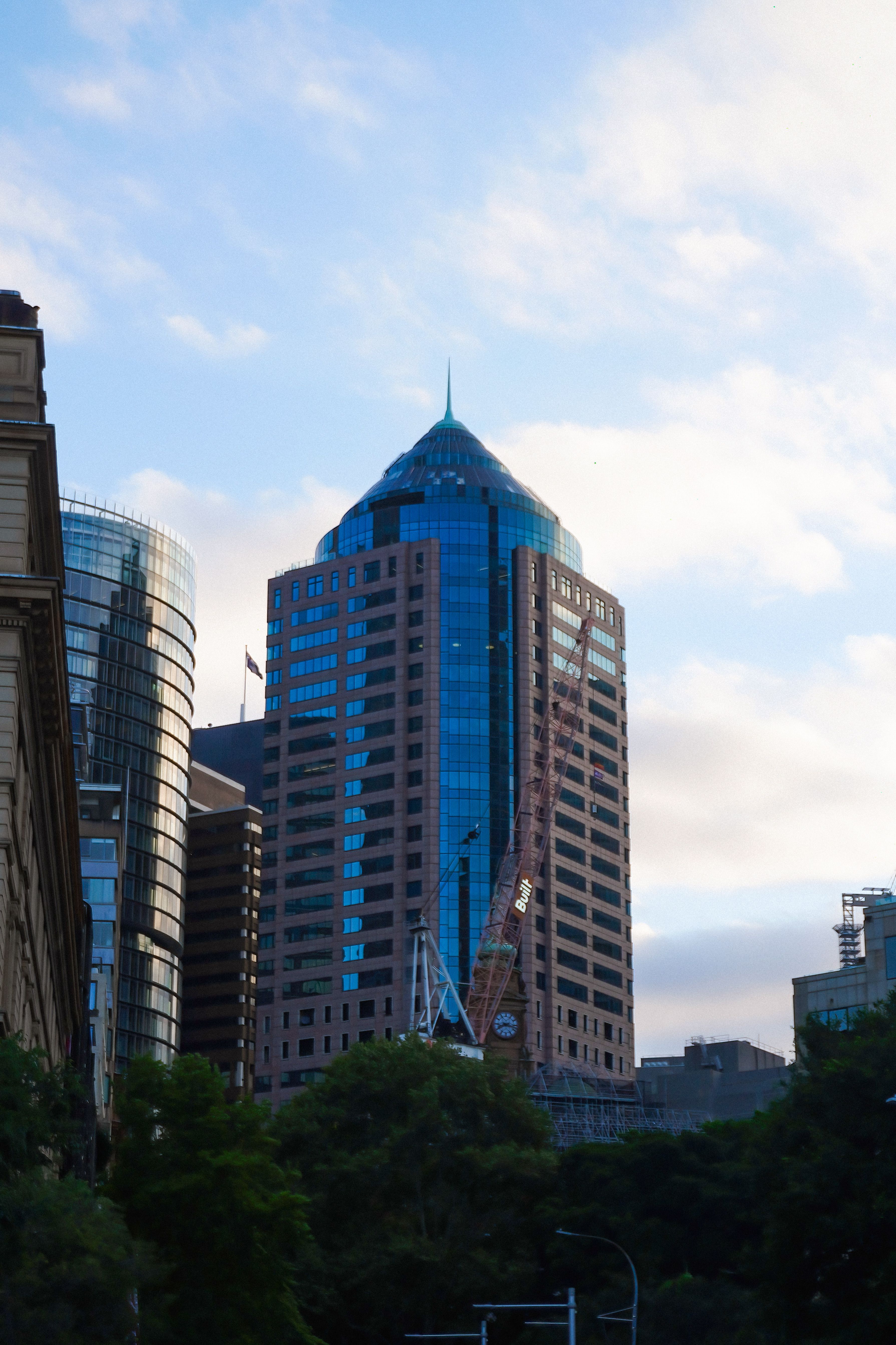 Modern Skyscraper in Urban Landscape at Dusk · Free Stock Photo