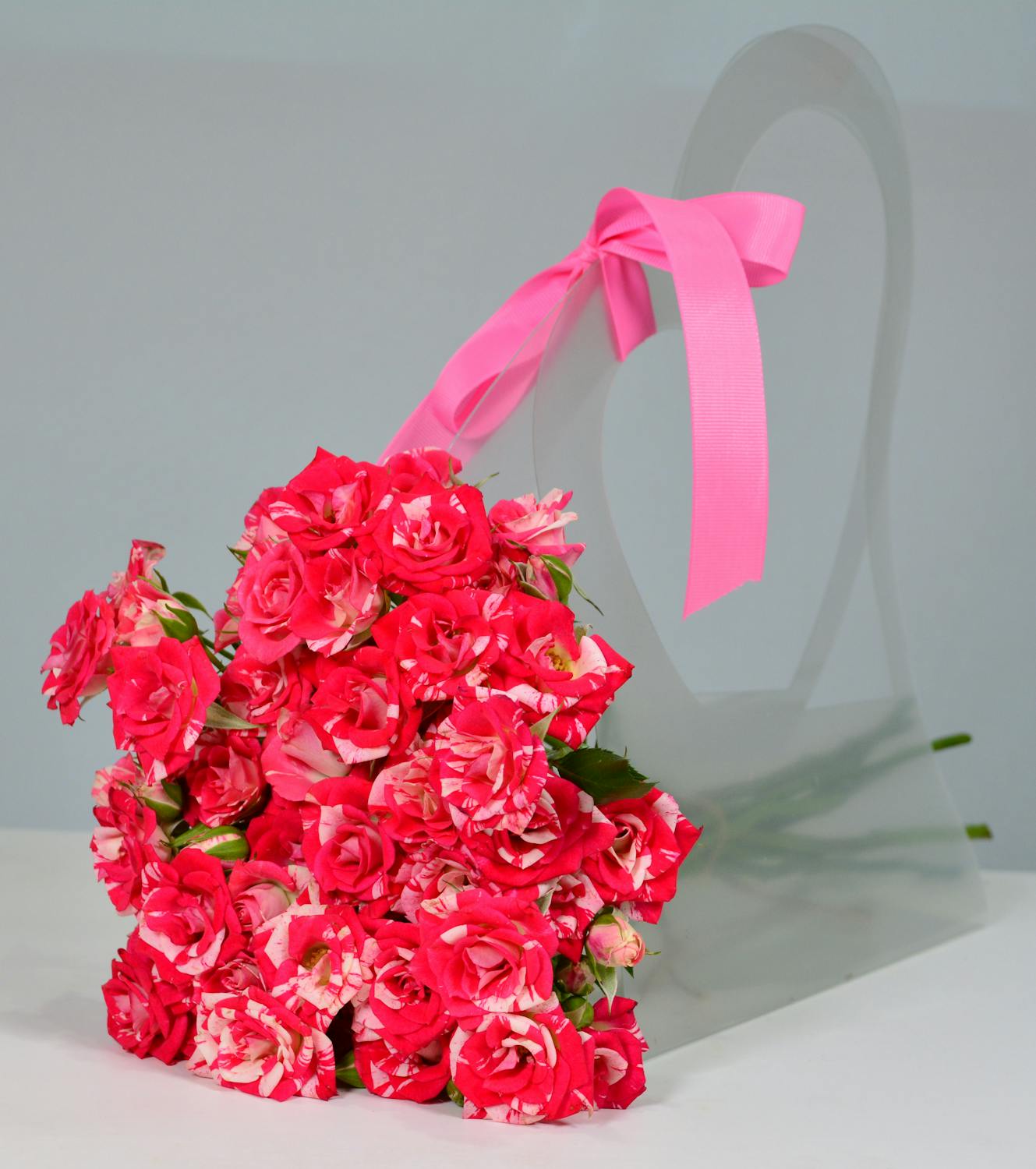 Vibrant Bouquet of Pink Roses with Ribbon · Free Stock Photo