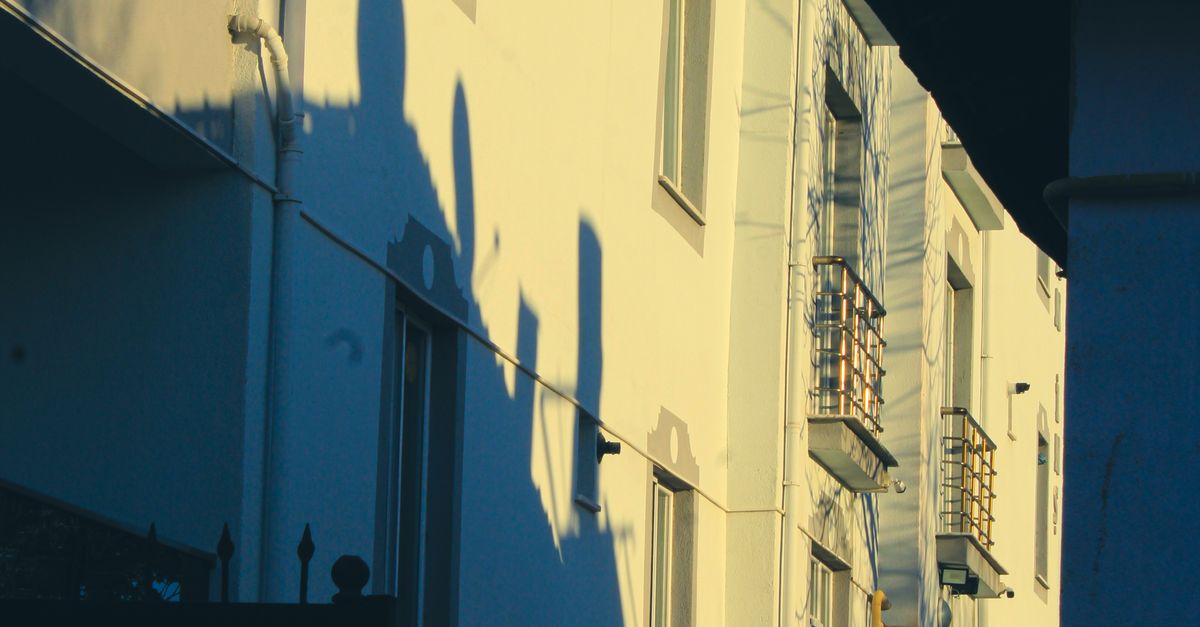 Dramatic Shadows on Urban Building Facade · Free Stock Photo