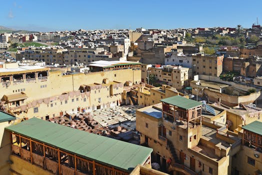 Explore the vibrant urban landscape of Fès, showcasing traditional architecture.