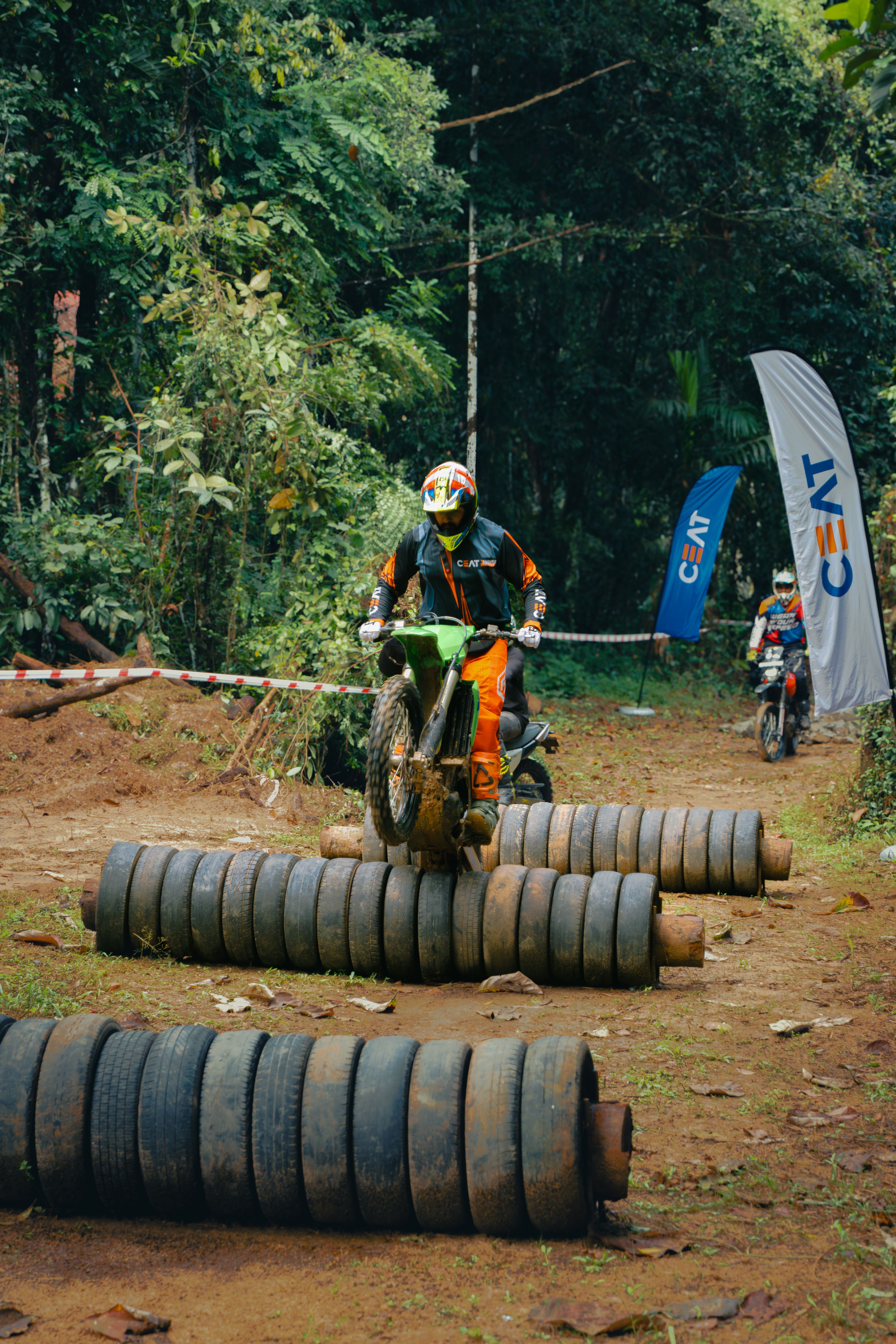 Exciting Off-road Motorcycle Racing in Forest · Free Stock Photo