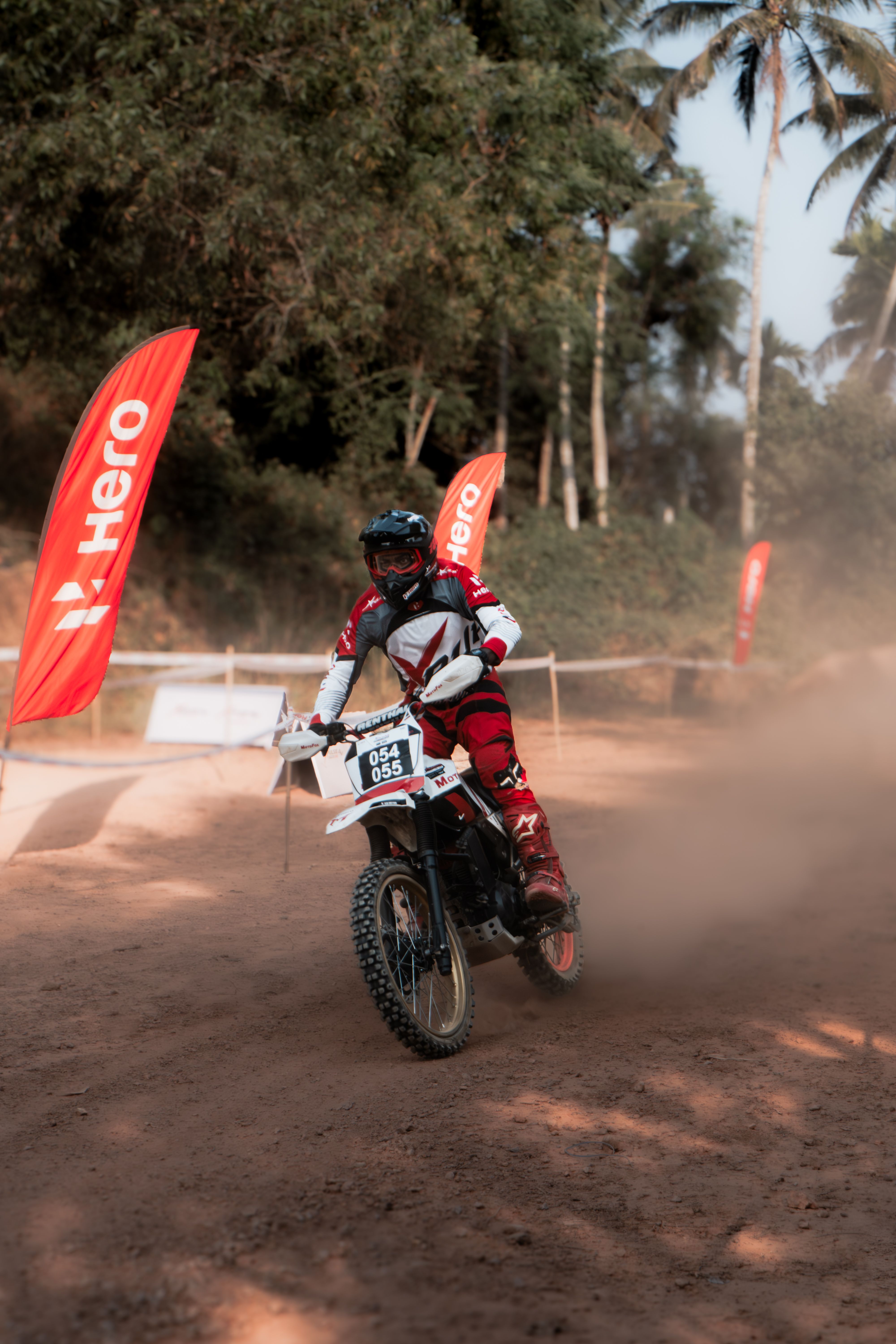 Off-road Motorcycle Racing in Dusty Terrain · Free Stock Photo