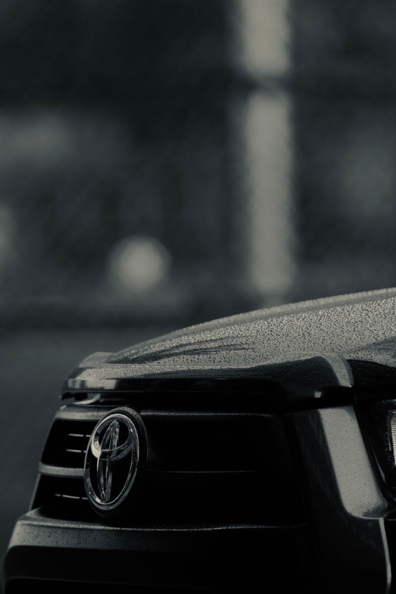 Detailed shot of a Toyota car grille showcasing brand emblem