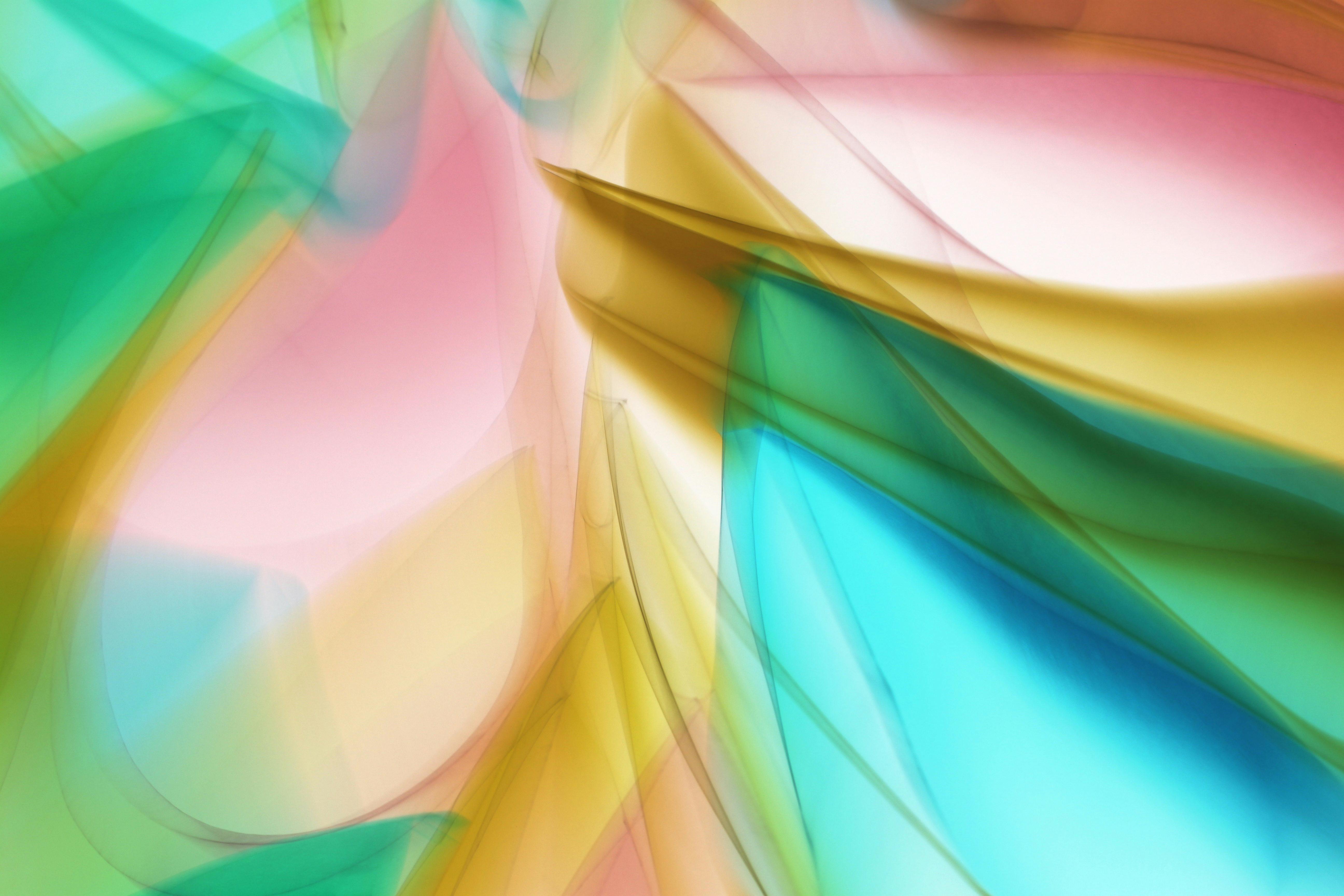 De franc Disseny abstracte vibrant amb formes fluides en tons pastel que crea una composició dinàmica i artística. Foto d'estoc