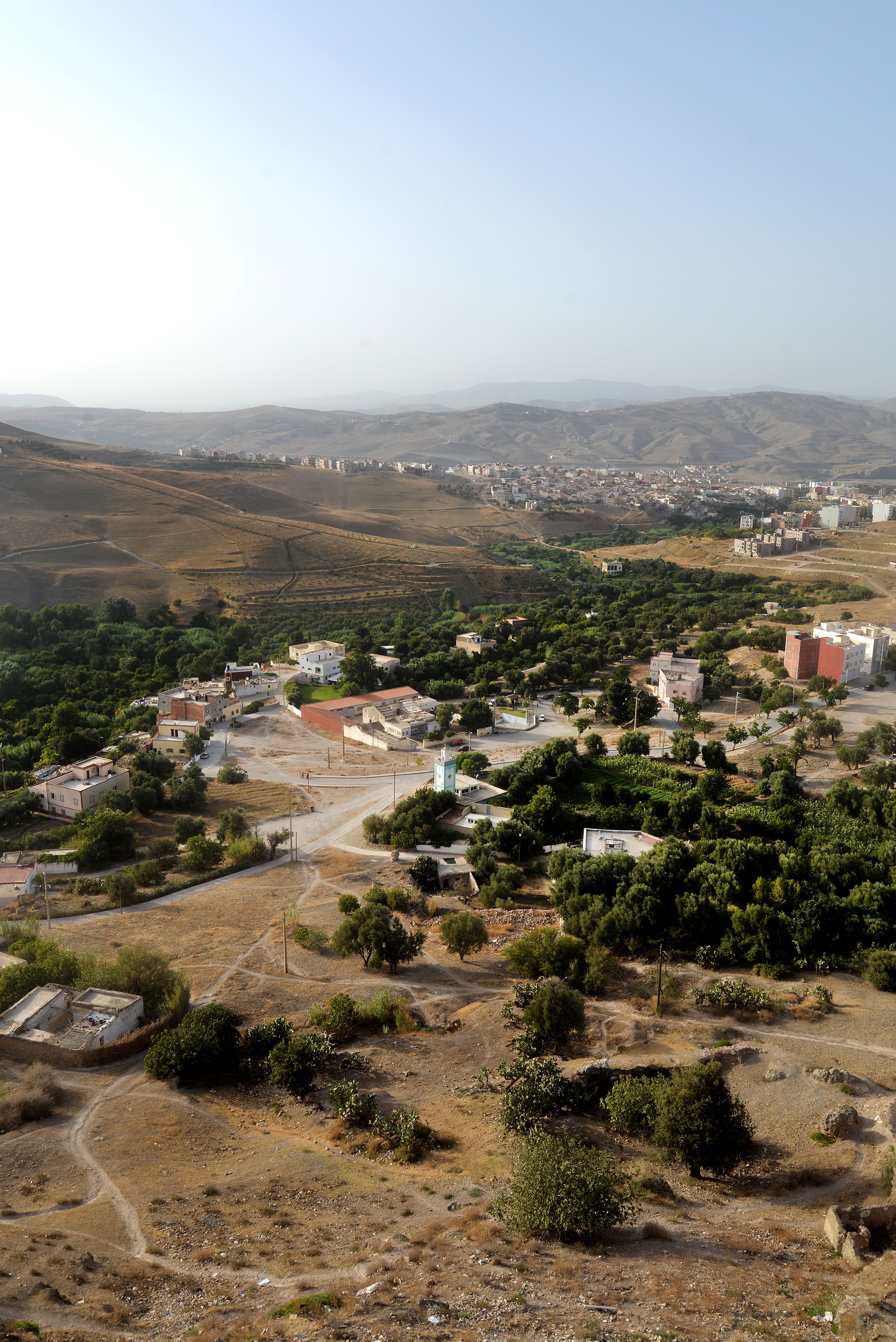 Aerial view of Taza, Morocco showcasing urban landscape and surrounding hills.