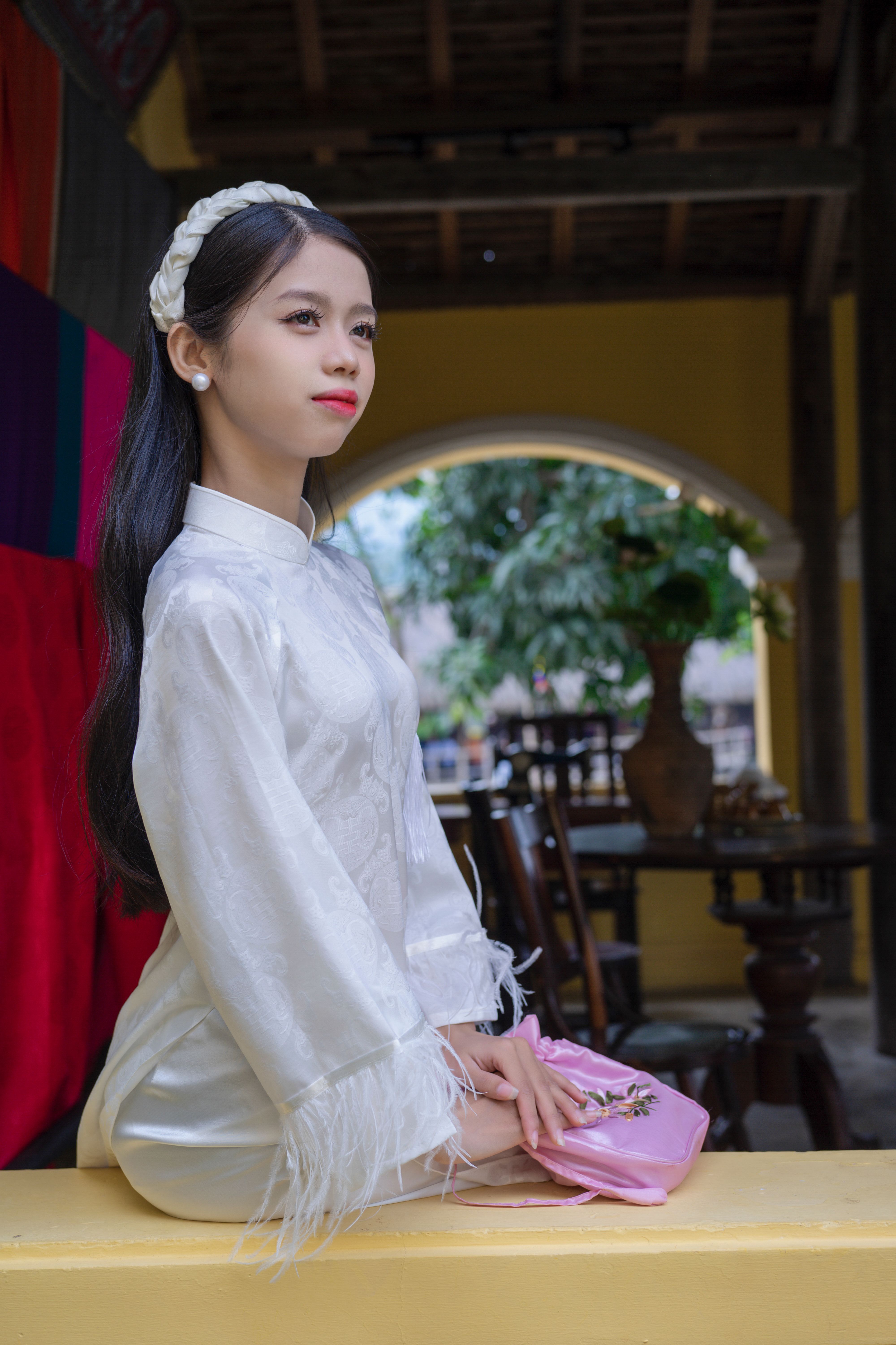 Elegant Woman in Traditional Silk Dress Indoors · Free Stock Photo