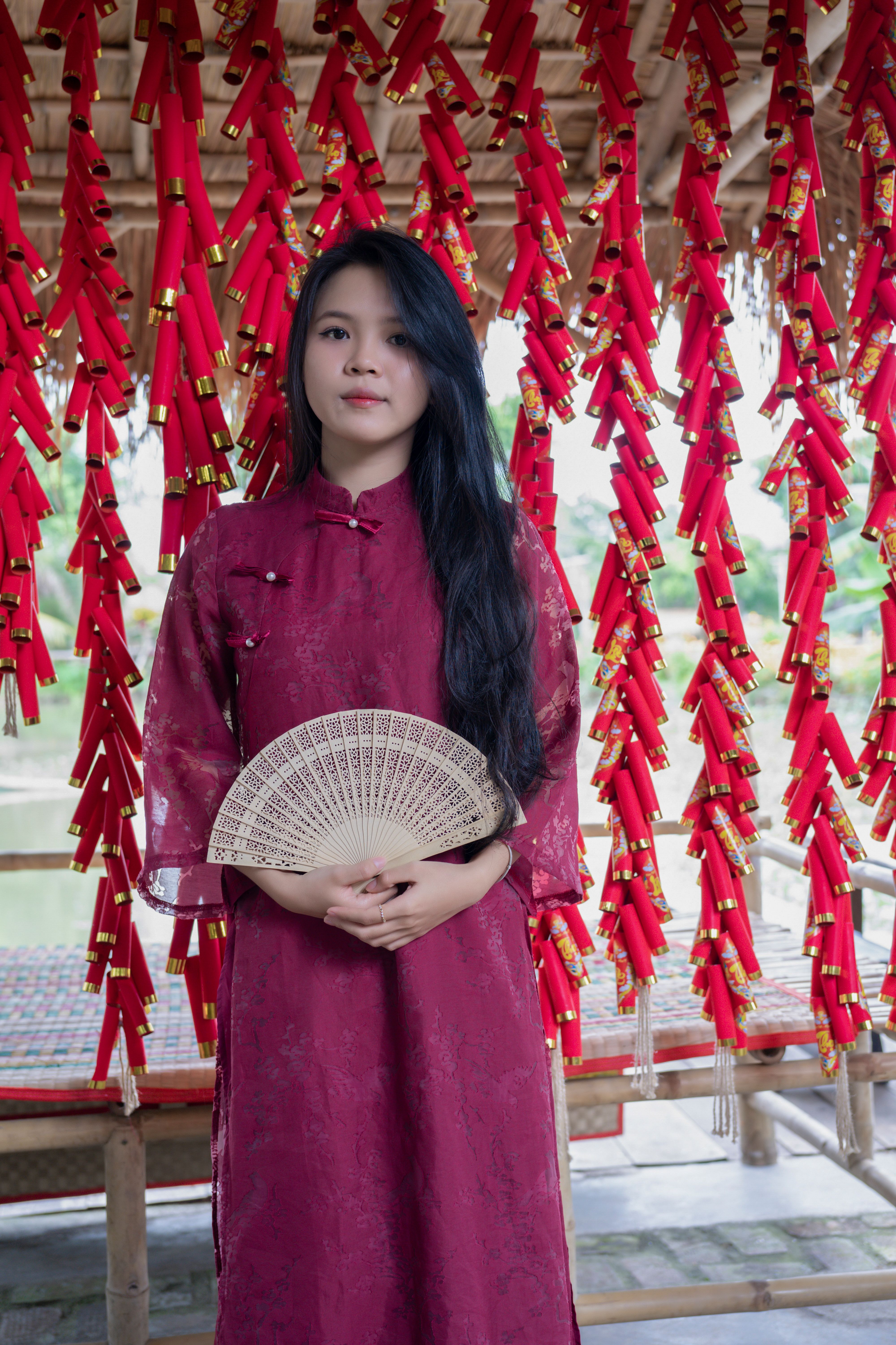 Young Woman in Red Traditional Dress with Fan · Free Stock Photo