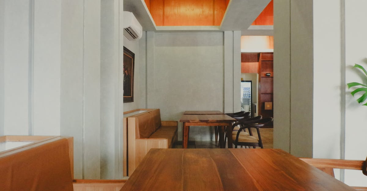 A cozy, minimalist cafe interior in Jawa Barat, Indonesia, showcasing modern aesthetics.