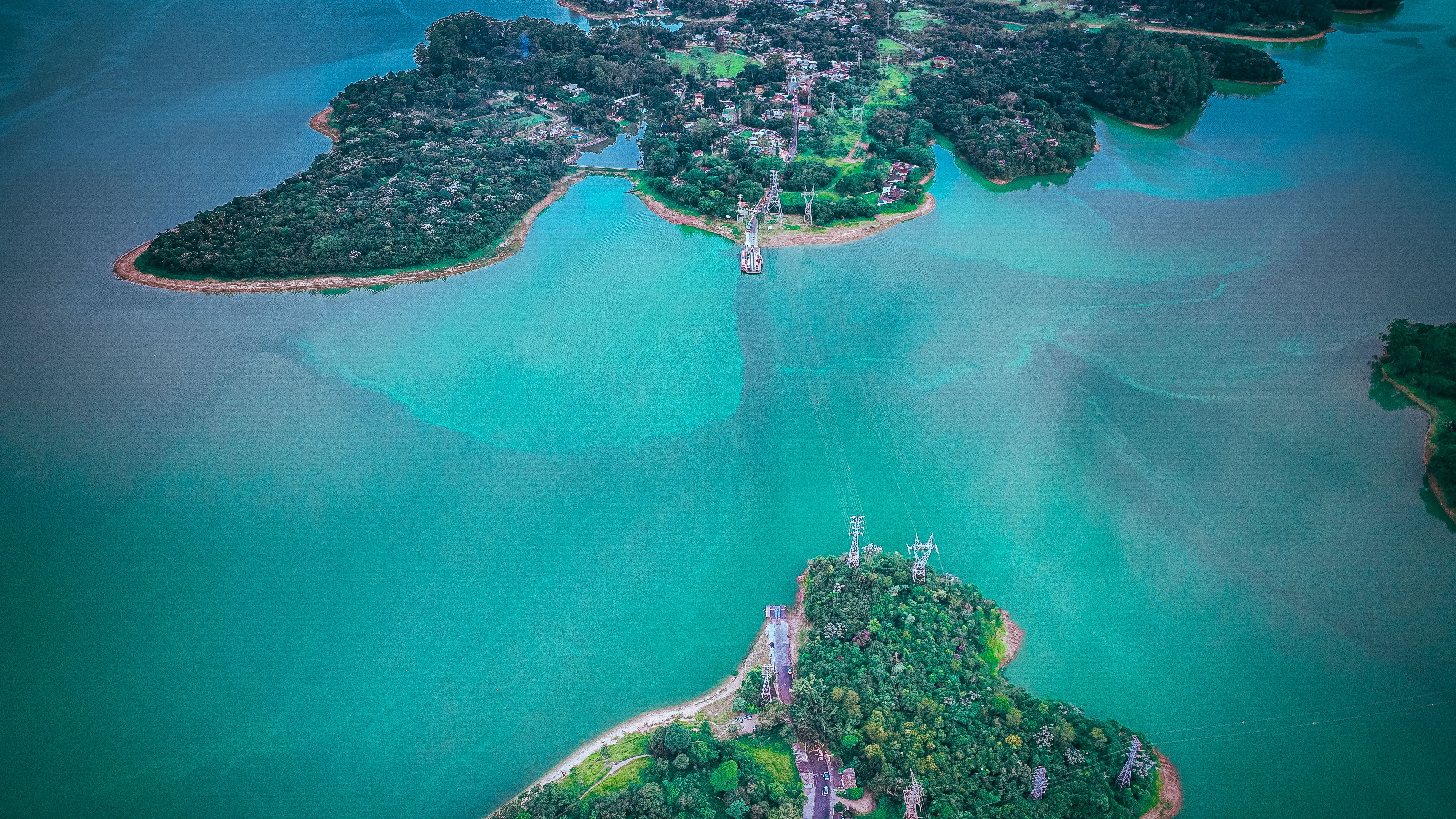 Aerial View of Lush Green Island in Blue Waters · Free Stock Photo