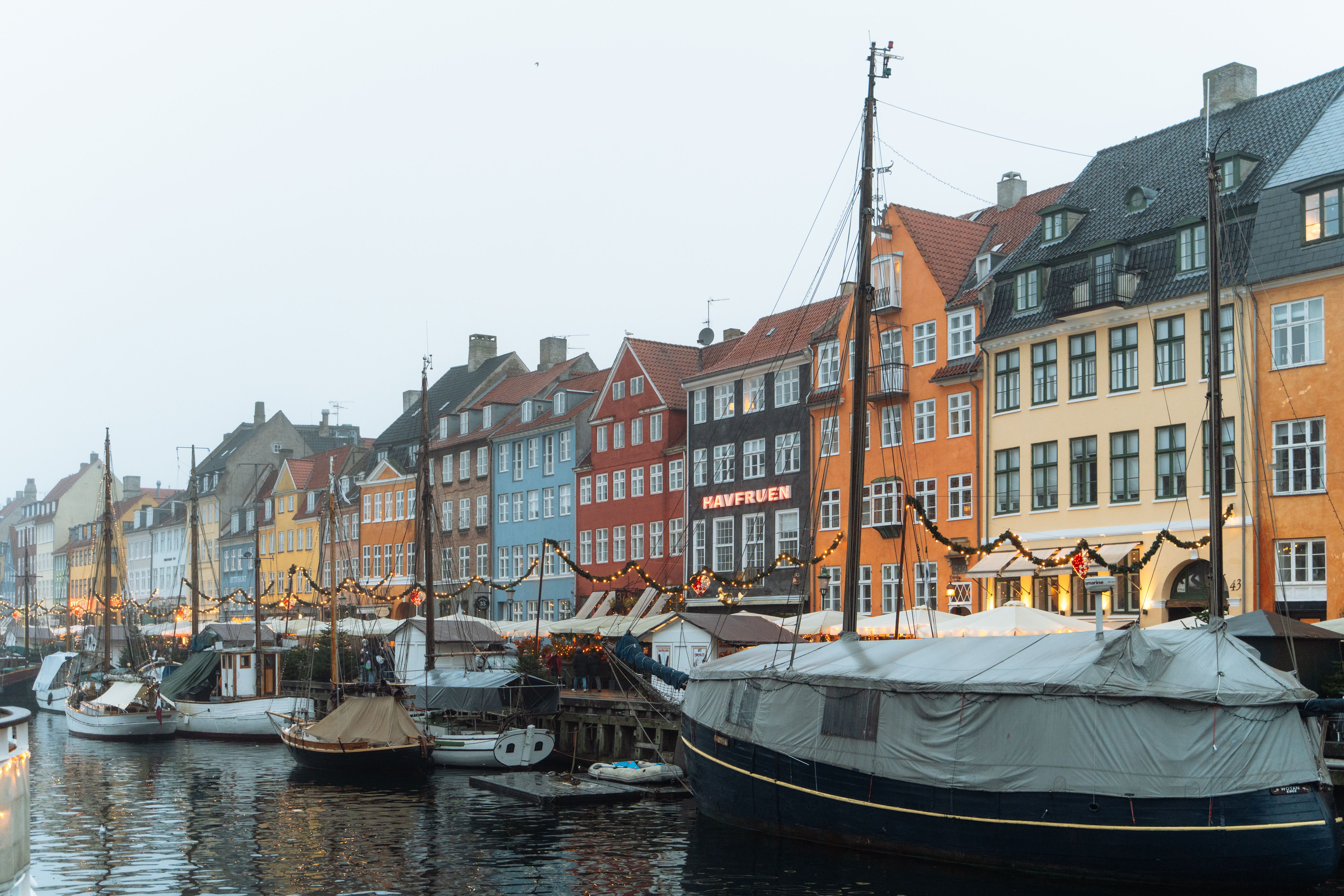 Colorful Copenhagen Harbor with Docked Boats · Free Stock Photo