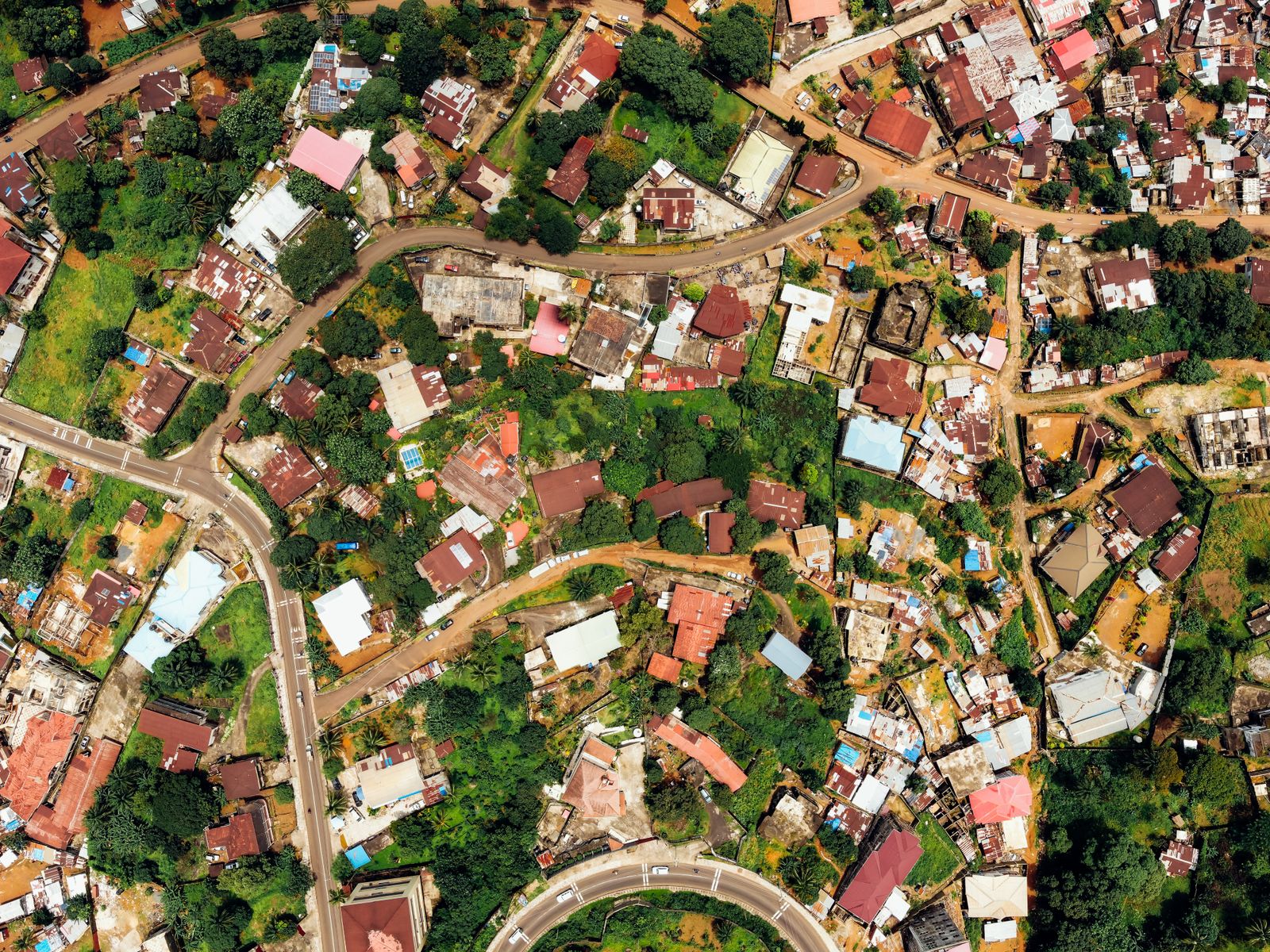 Aerial photograph of residential house roofs in a colorful Dallas neighborhood