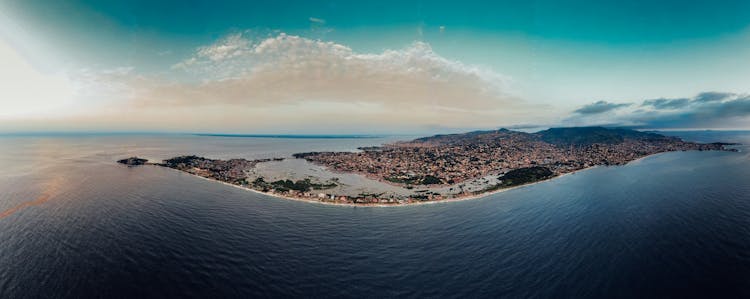 Aerial Photo Of Island With Dense Population