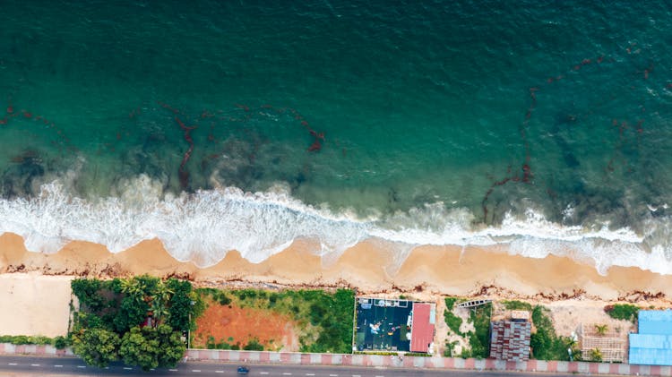 Aerial Photo Houses By The Beach