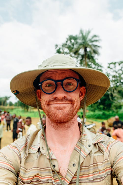 Smiling Man Wearing Gray Hat