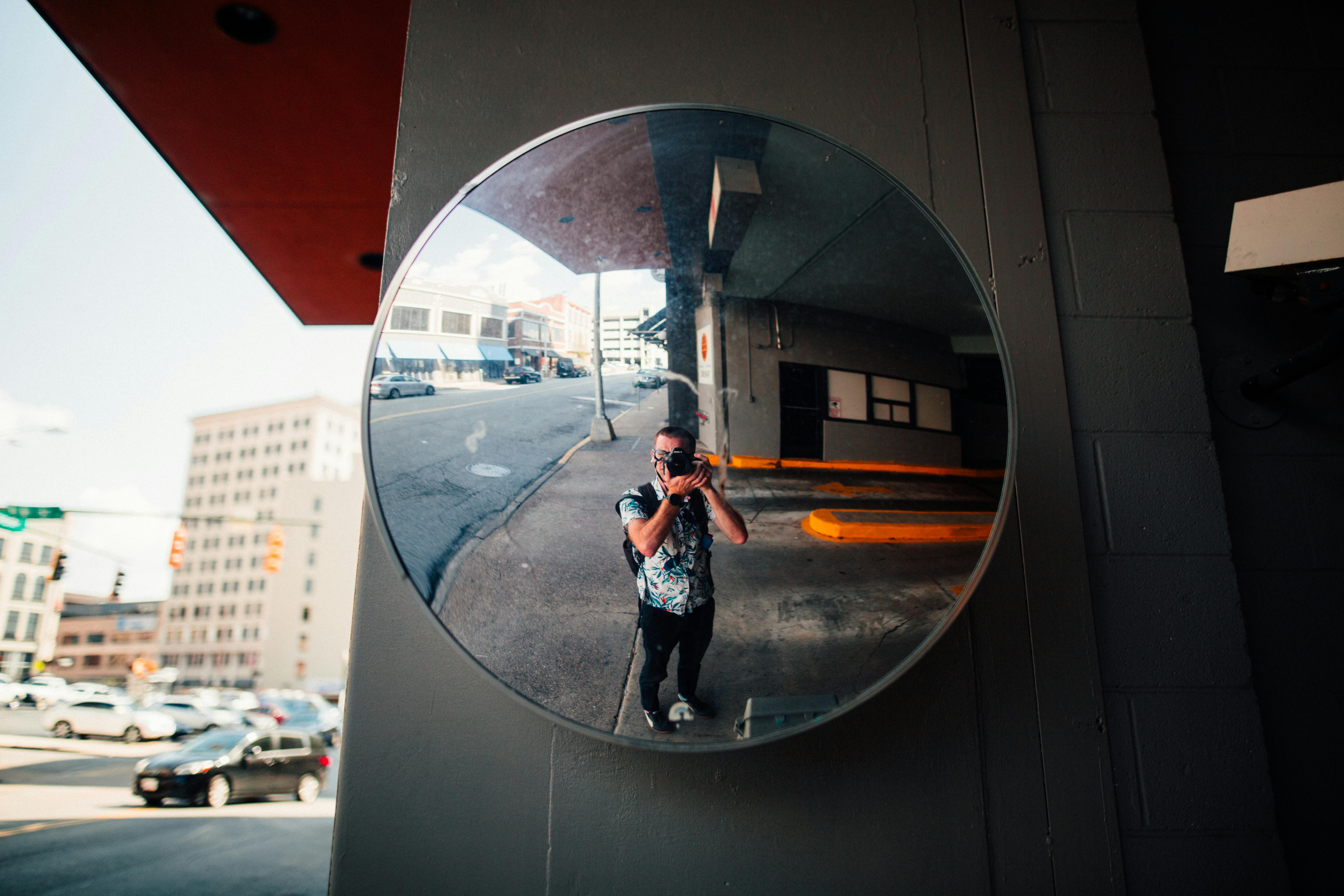 Man Standing in Front of the Mirror · Free Stock Photo