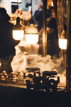 Warm scene from a bustling Istanbul market stall with glowing lights and roasting chestnuts.