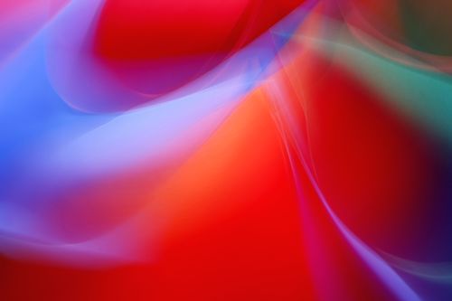 Free Dynamic abstract image with red and blue waves creating a vibrant flow. Stock Photo