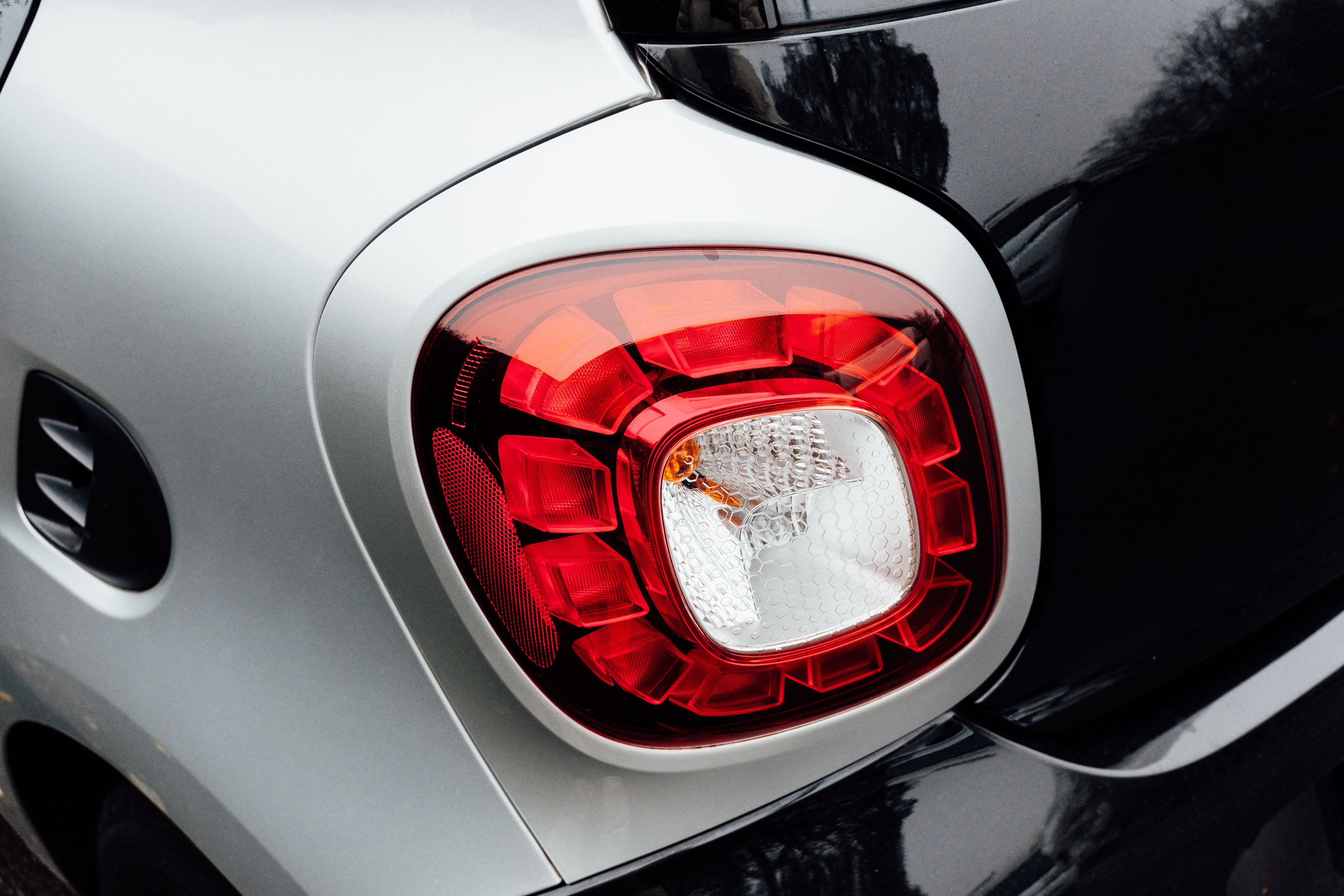 Close-up of Modern Car Tail Light Design · Free Stock Photo