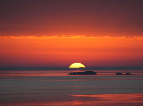 Beautiful sunrise over Cove Island Park, Stamford, capturing the serene morning light and vibrant colors.