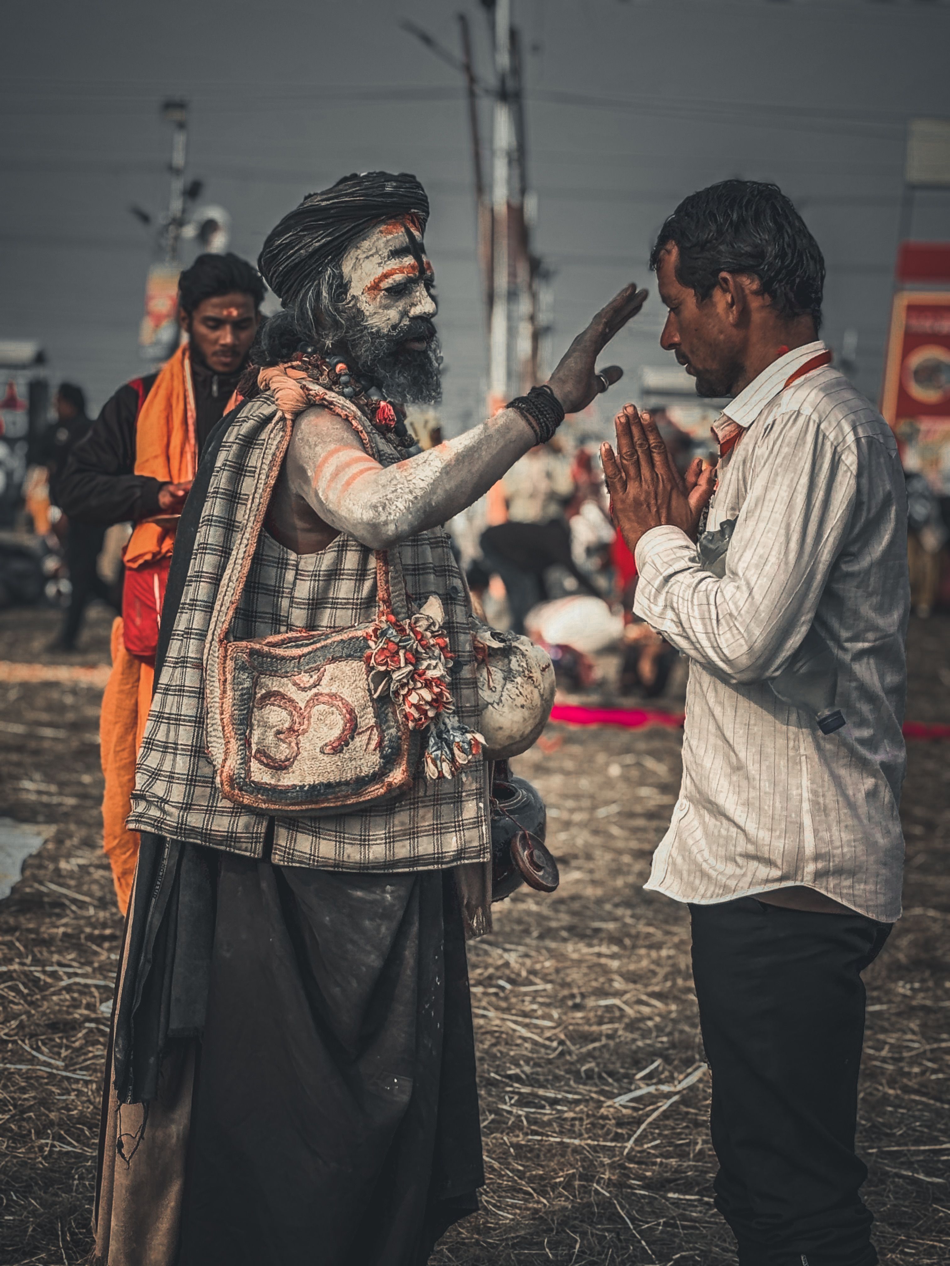 Cultural Ritual with Hindu Sadhu and Devotee · Free Stock Photo