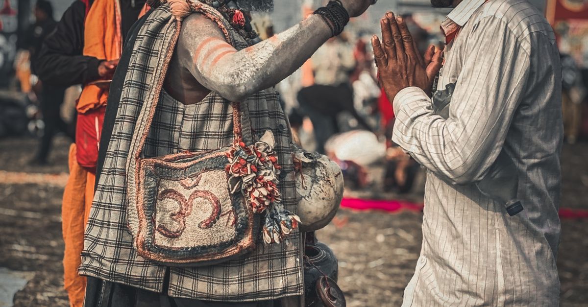 Respectful Rituals Cultural Ritual with Hindu Sadhu and Devotee · Free Stock Photo