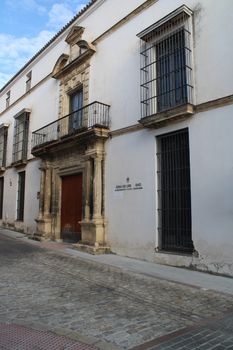 Classic facade of a heritage building in El Puerto de Santa María, Spain.