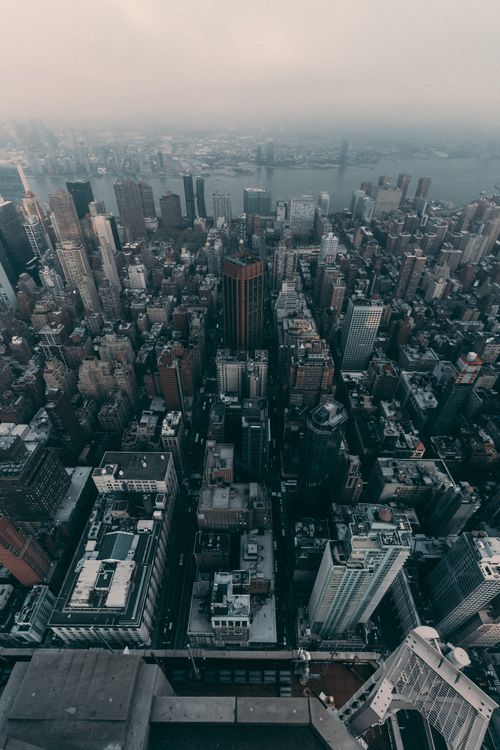 Free Captivating aerial photograph showcasing the dense skyline of New York City from above. Stock Photo