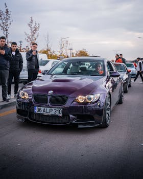BMW M3 showcased at a vibrant car meet in Ankara, attracting automotive enthusiasts.