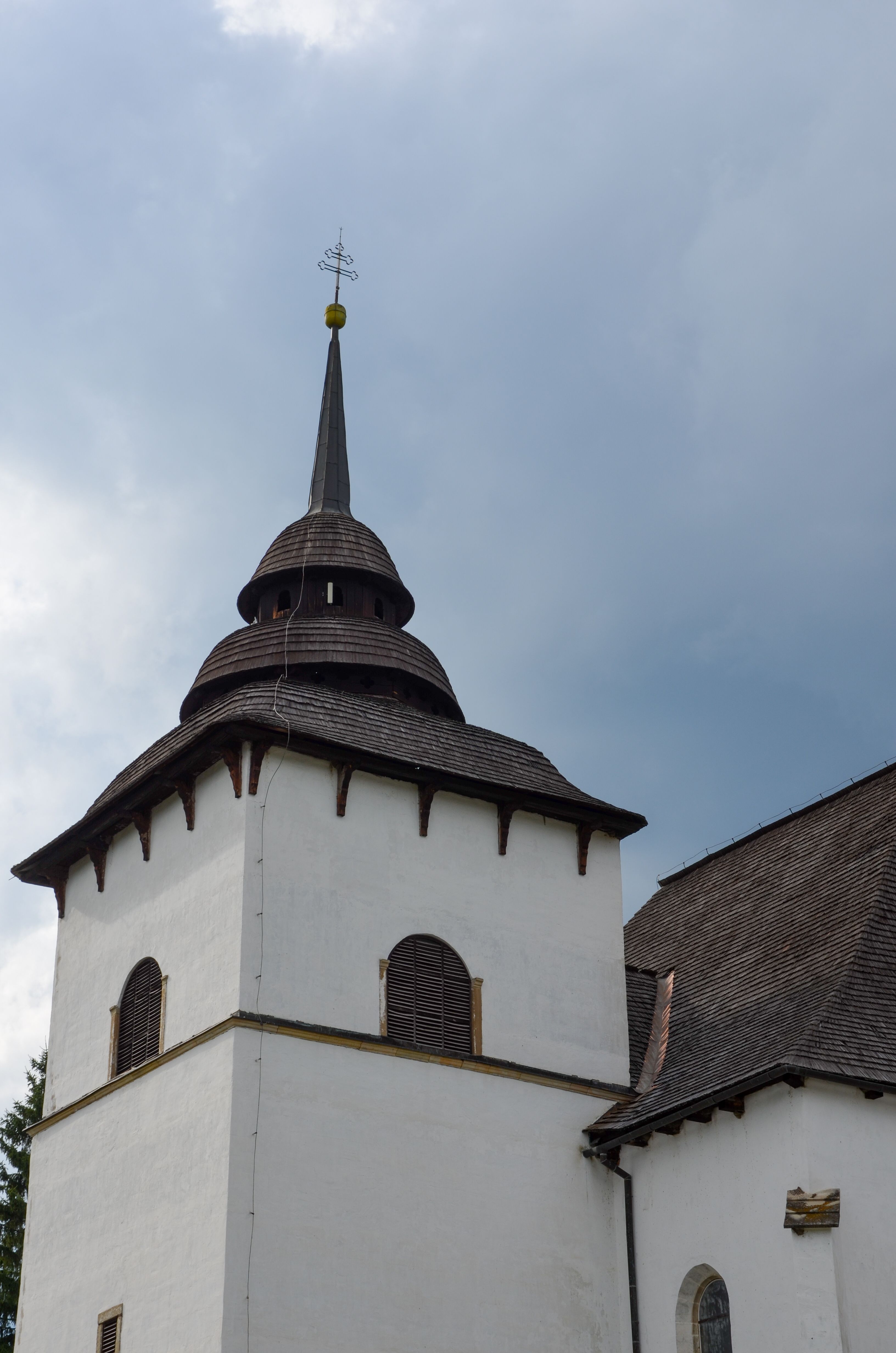 Historic Church Tower Against Cloudy Sky · Free Stock Photo