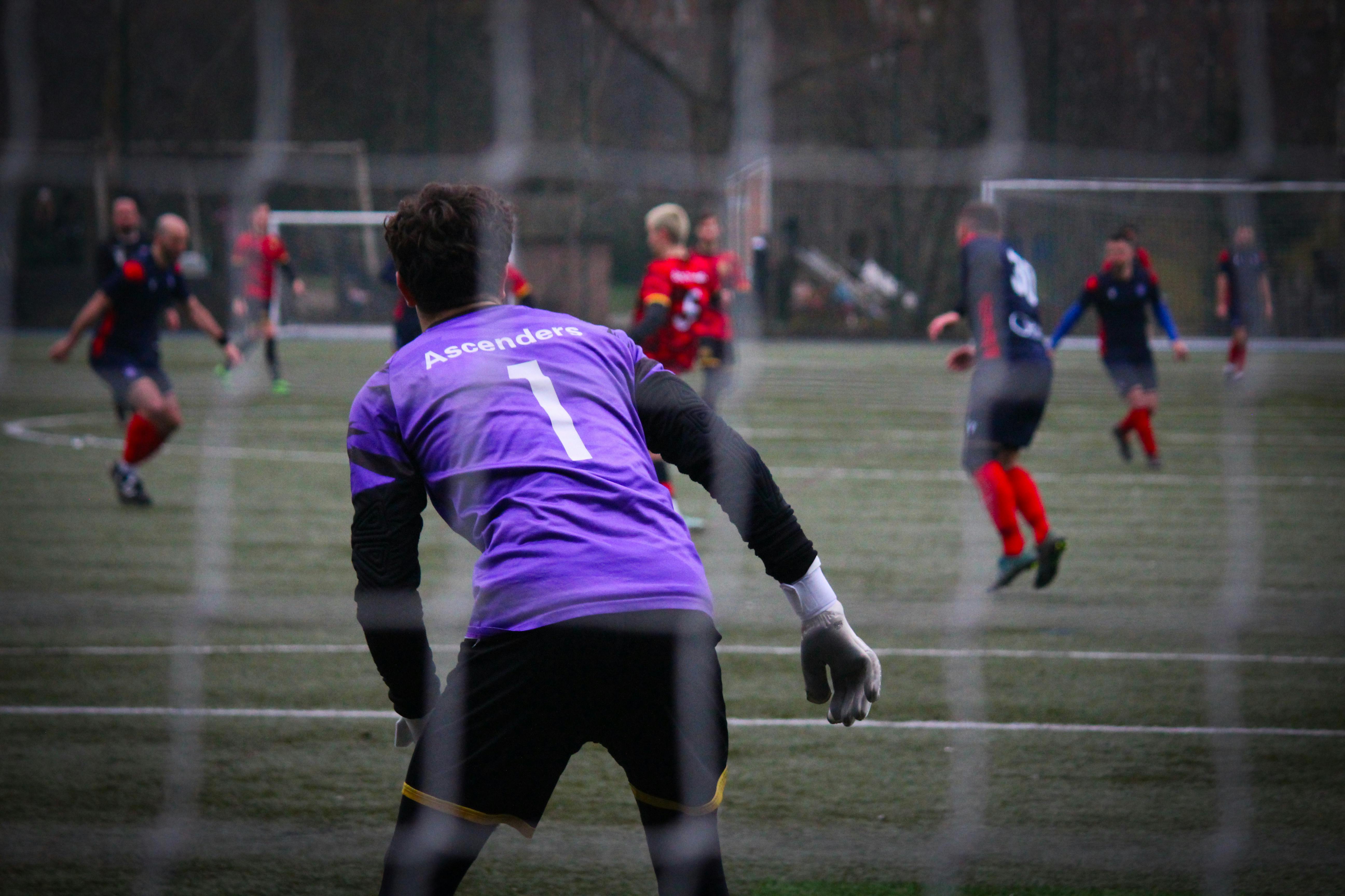 goalkeeper observing soccer match in action