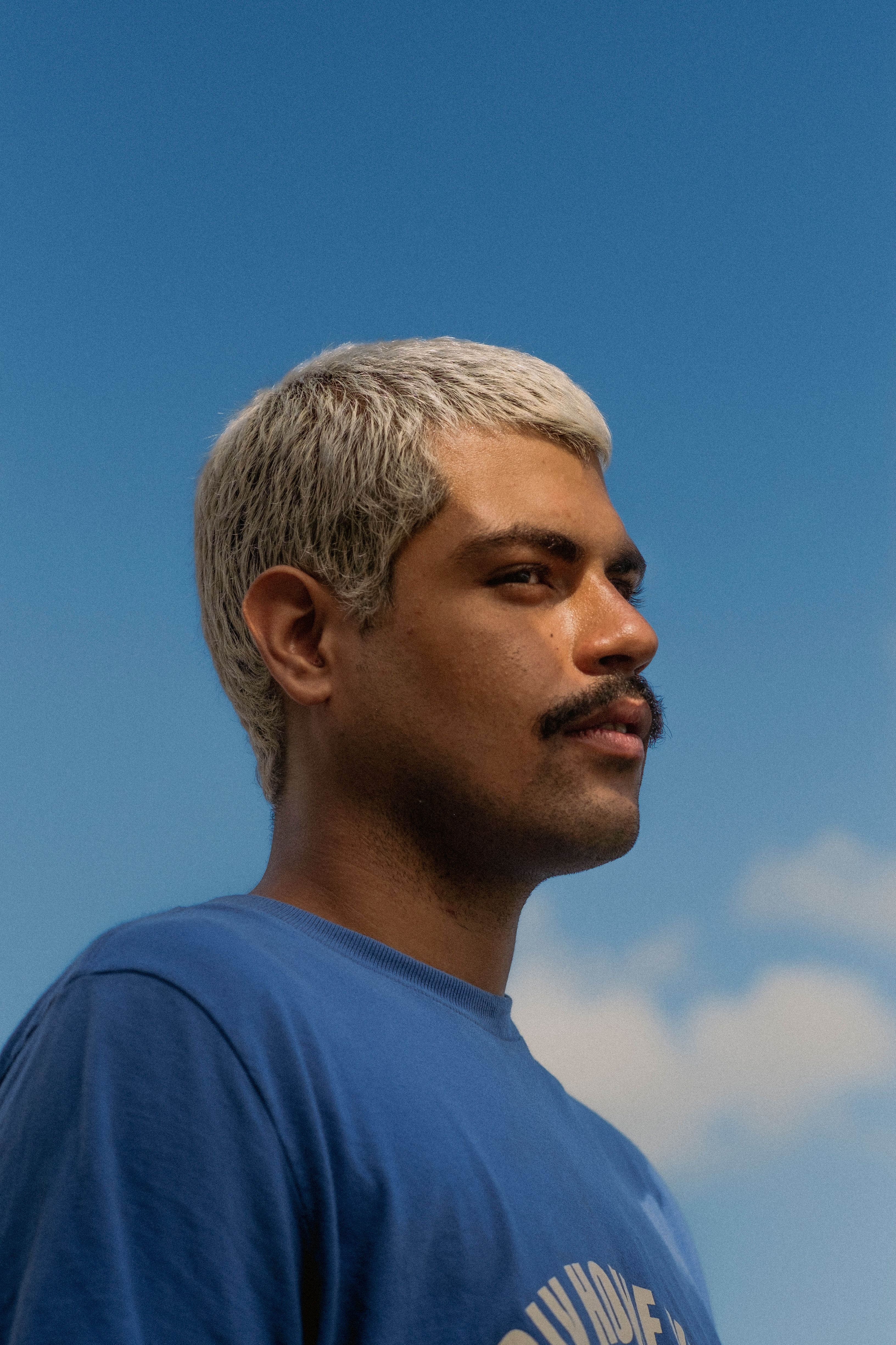 Portrait of a Man Against Clear Blue Sky · Free Stock Photo