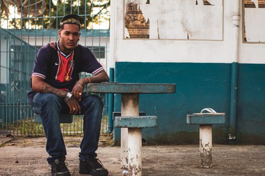 Casual portrait of a man in urban Lorena, São Paulo setting.