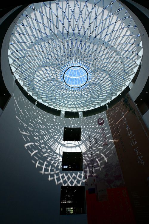 Free Stunning modern skylight with intricate geometric patterns, filling the room with light. Stock Photo